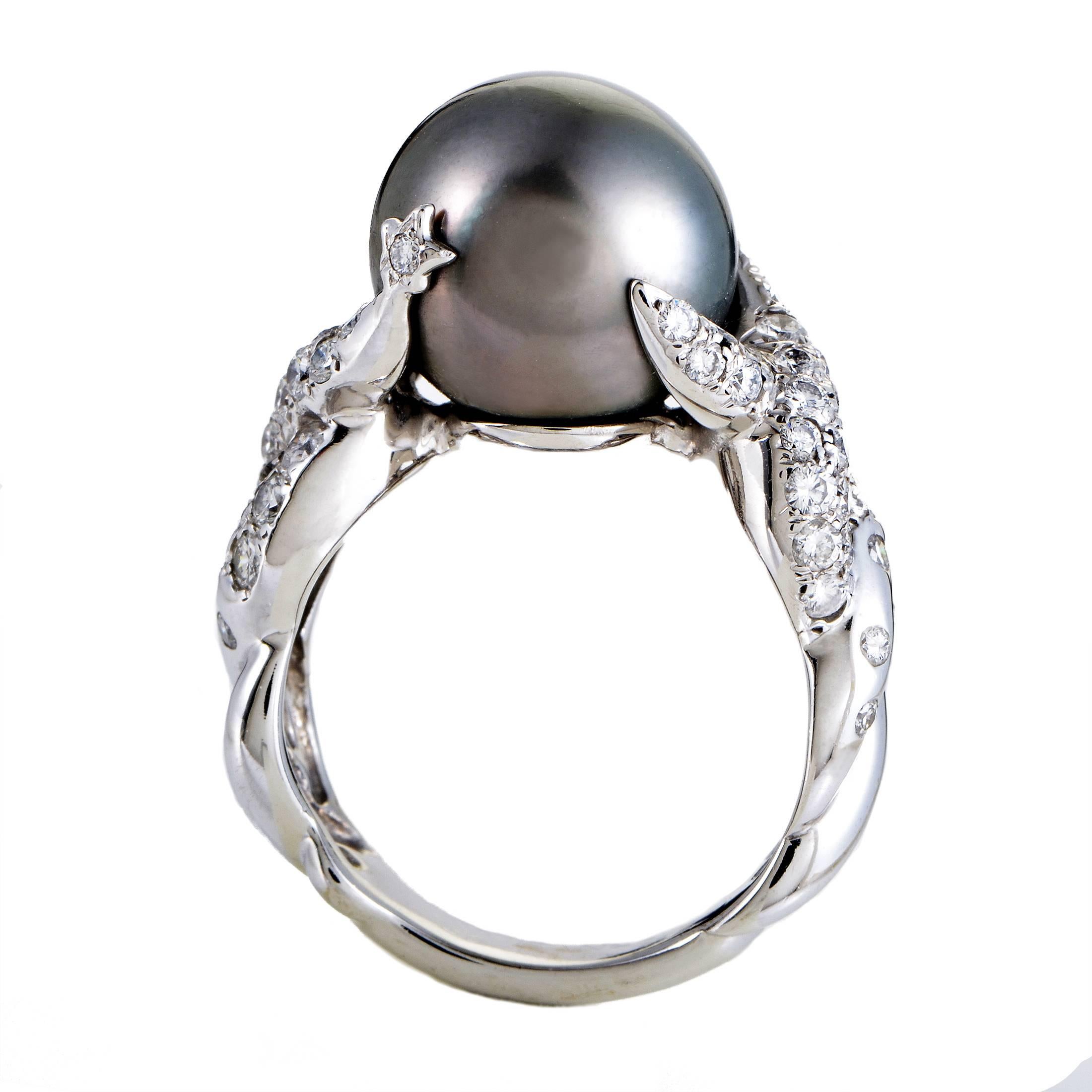 Held firmly and gracefully by the marvelously entwined 18K white gold body that is embellished with scintillating diamonds weighing in total 0.80ct, the captivating 12mm Tahitian pearl produces a memorable sight in this fascinating ring from