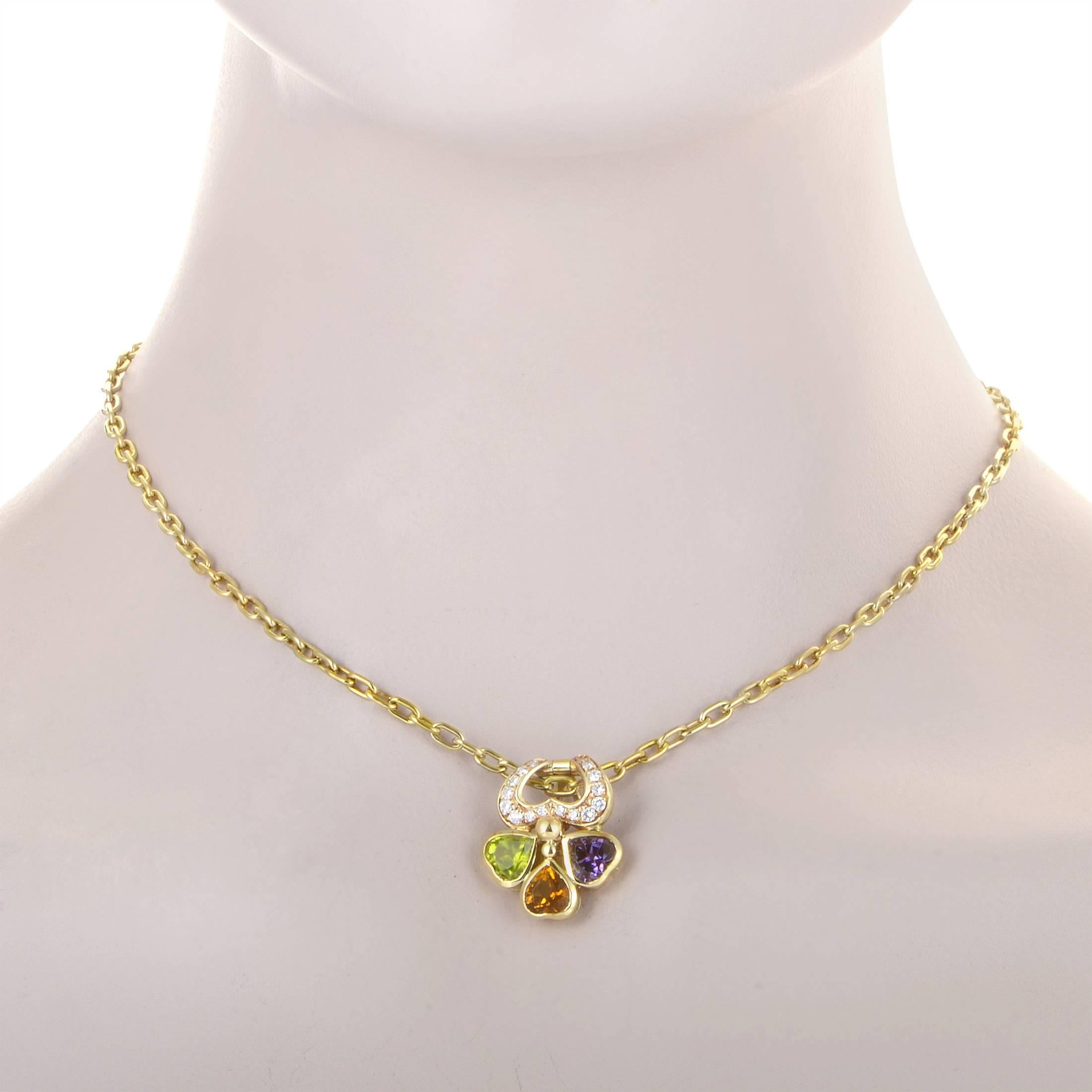 Boasting an exuberant and lavish pendant embellished with lively colors and dazzling glisten, this gorgeous 18K yellow gold necklace from Pomellato is set with lustrous diamonds totaling 0.45ct, as well as a stunning peridot, delightful amethyst and