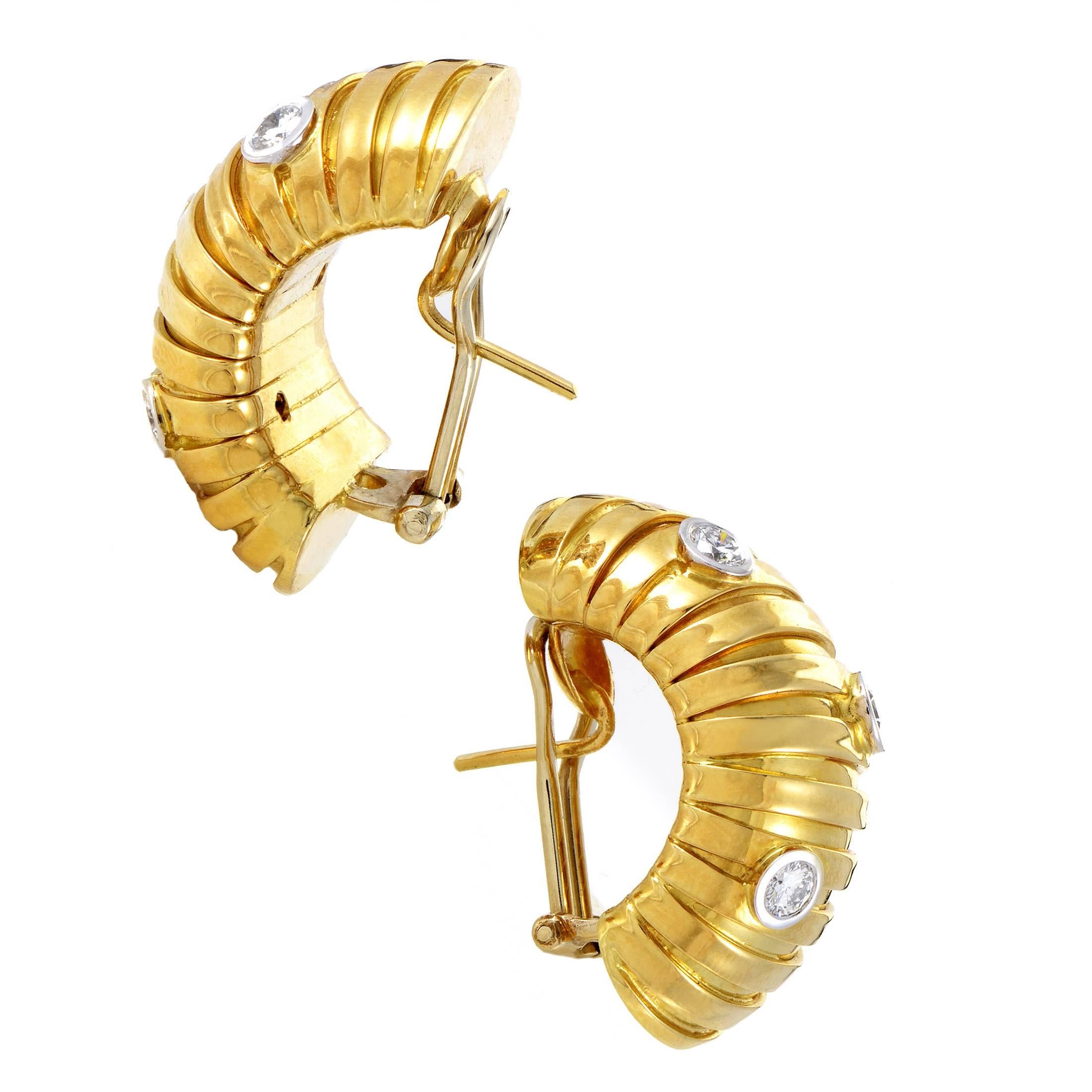 The fabulously warm and immaculately gleaming 18K yellow gold is brilliantly contrasted by the bright shimmering 18K white gold which is adorned with resplendent diamonds weighing in total 0.60ct in these fascinating earrings from Weingrill.