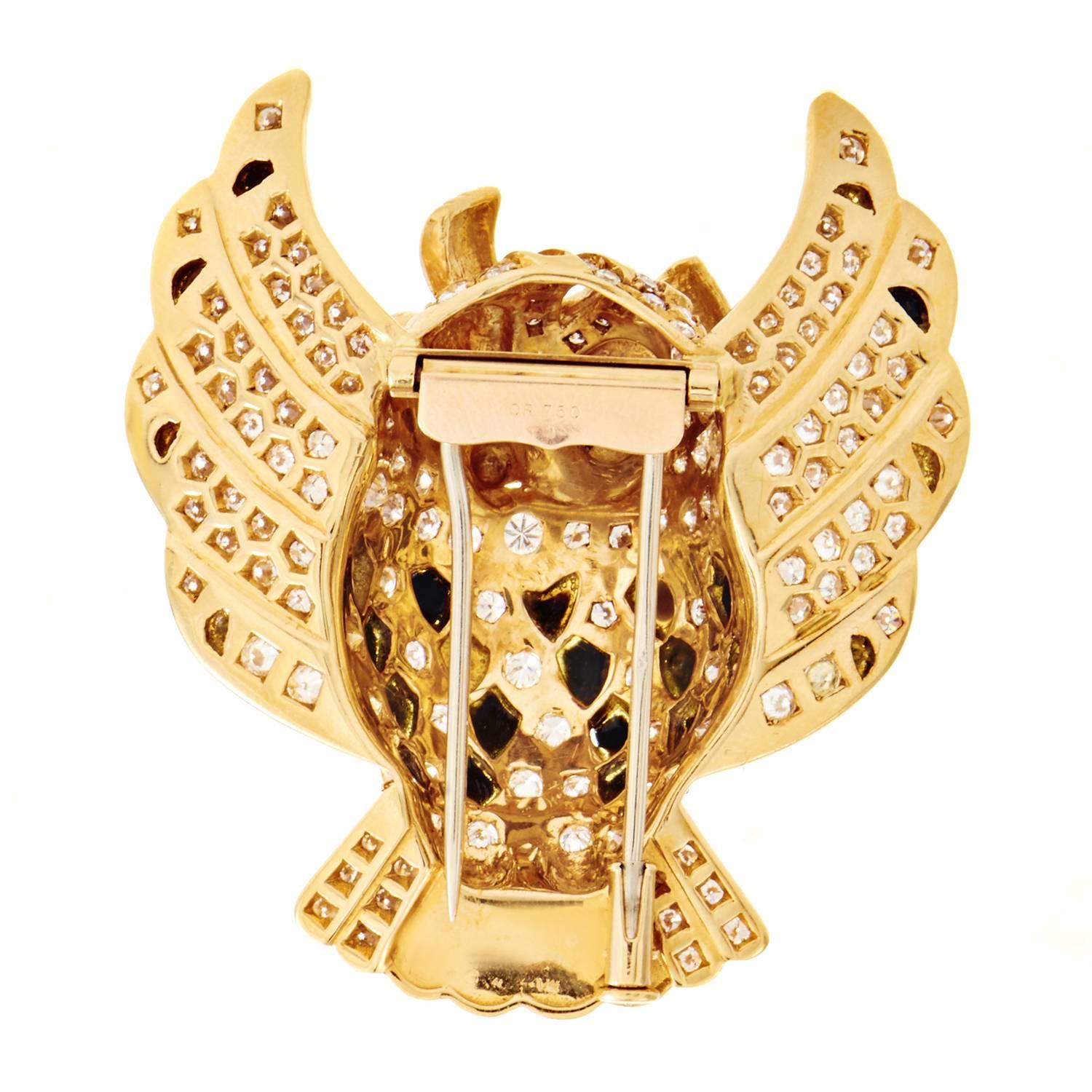 Boasting rare French hallmarks, this brooch is the perfect piece for a serious jewelry collector. The adorable motif of an owl is given a touch of glamorous exuberance in this lavishly ornamented brooch made of precious 18K yellow gold and