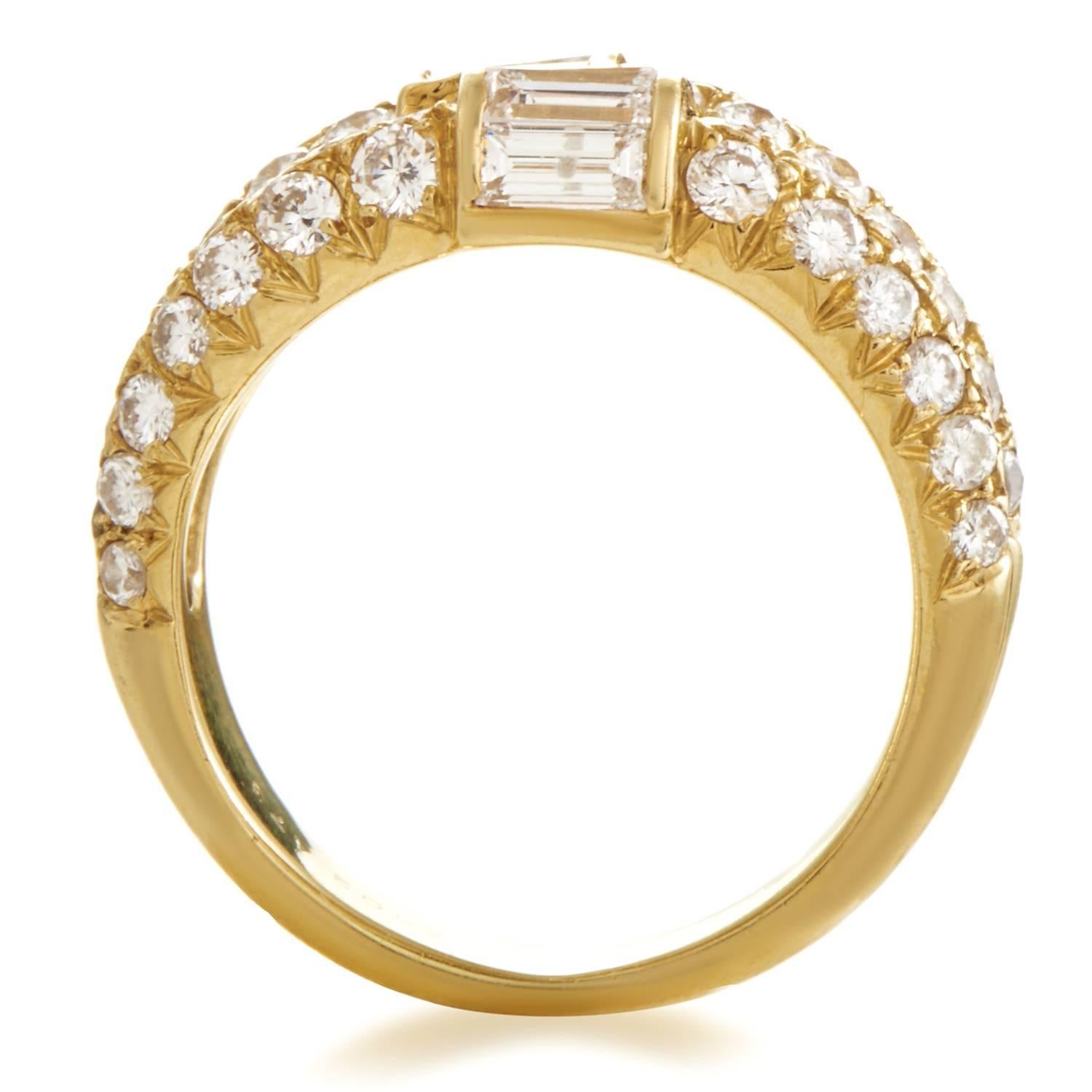 Lavishly embellished with diversely cut and fascinatingly glistening diamonds weighing in total 2.25 carats, this majestic ring from Van Cleef & Arpels is made of radiant 18K yellow gold and offers a look of dazzling luxury.
Ring Size: 6.0 (51