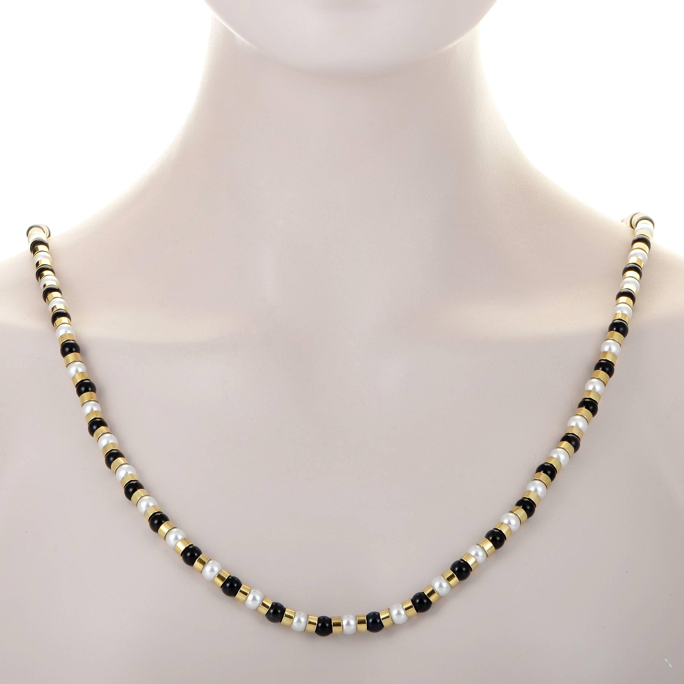 In a stunningly elegant design, eye-catching effect is produced through tastefully contrasting blend of splendid pearls and striking onyx stones interspersed with radiant 18K yellow gold in this exceptional necklace from Chanel.
Included Items: