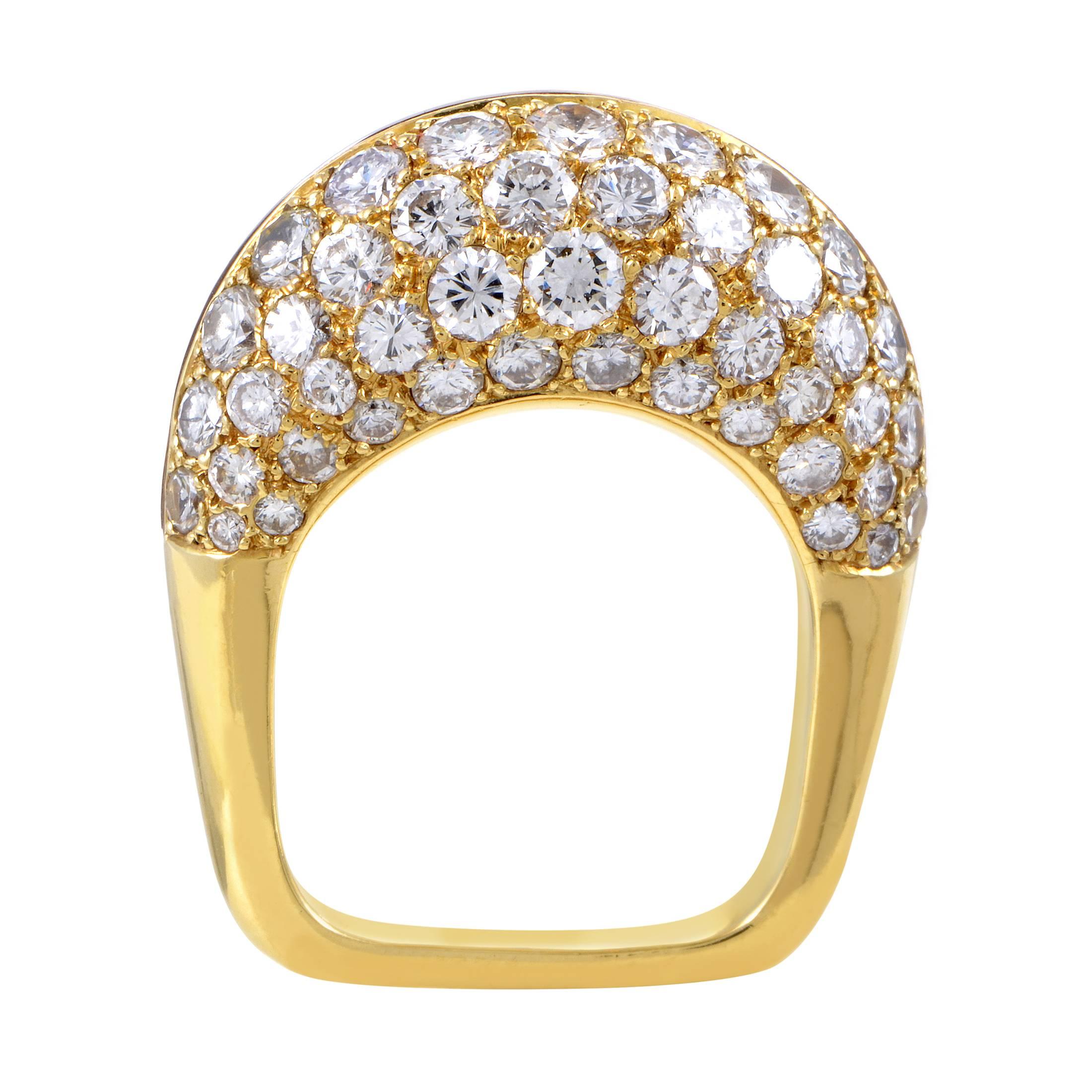 Employing tasteful duality in design to produce an intriguing visual effect while retaining pleasant harmony in delightful colors, Mauboussin present this fabulous ring made of 18K yellow gold embellished with F-color diamonds of VVS clarity