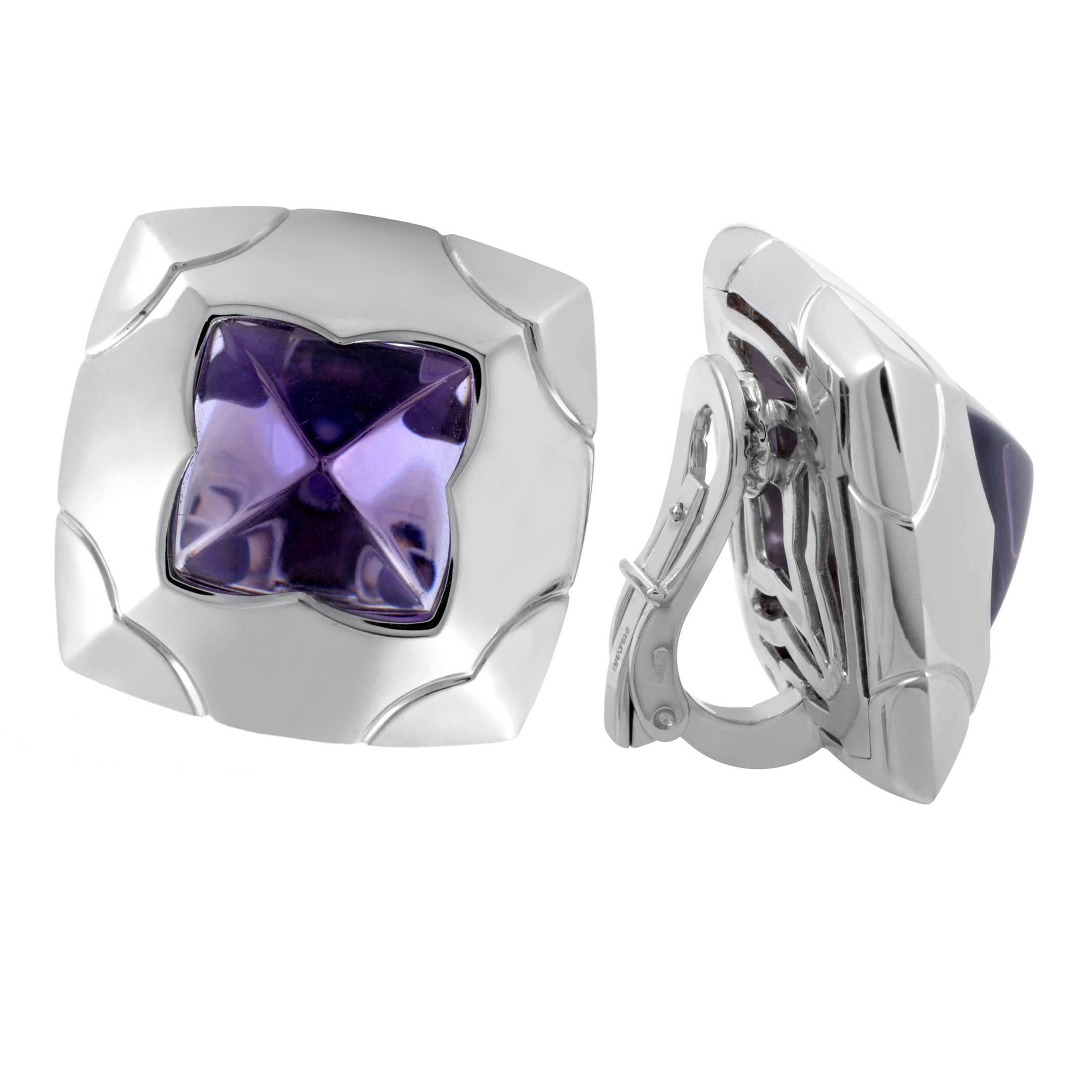 Boasting the brand's recognizable pyramidal shape and fascinatingly combining the gleaming 18K white gold with wonderfully glistening amethysts, these remarkable earrings from Bulgari are a delightful and appealing sight to behold.
Included Items: