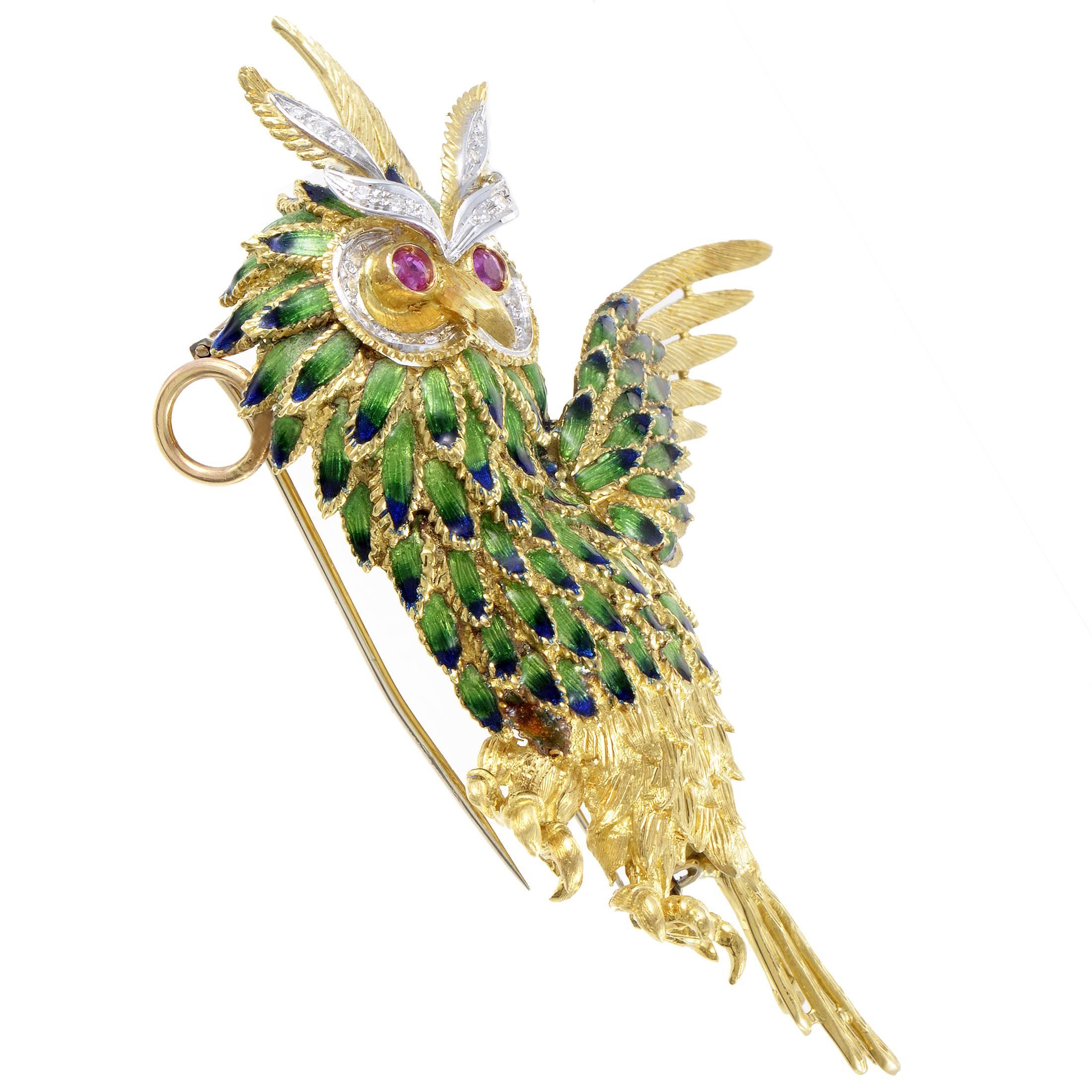 Employing astonishing gradient enamel to realistically depict the colorful beauty of an owl, this fantastic 18K yellow gold brooch also boasts gorgeous rubies as the adorable bird's eyes while sparkling diamonds totaling 0.25ct are set against