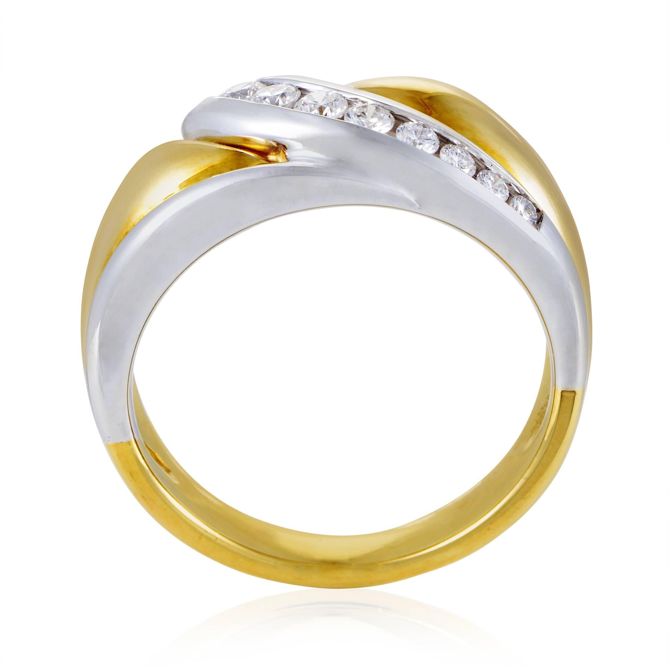 Flowing in smooth fashion and adorned with resplendent diamonds totaling 0.38ct upon its bright gleaming surface, the prestigious 18K white gold wonderfully cuts across the radiant 18K yellow gold in this graceful ring from Damiani.
Ring Size: 7.25