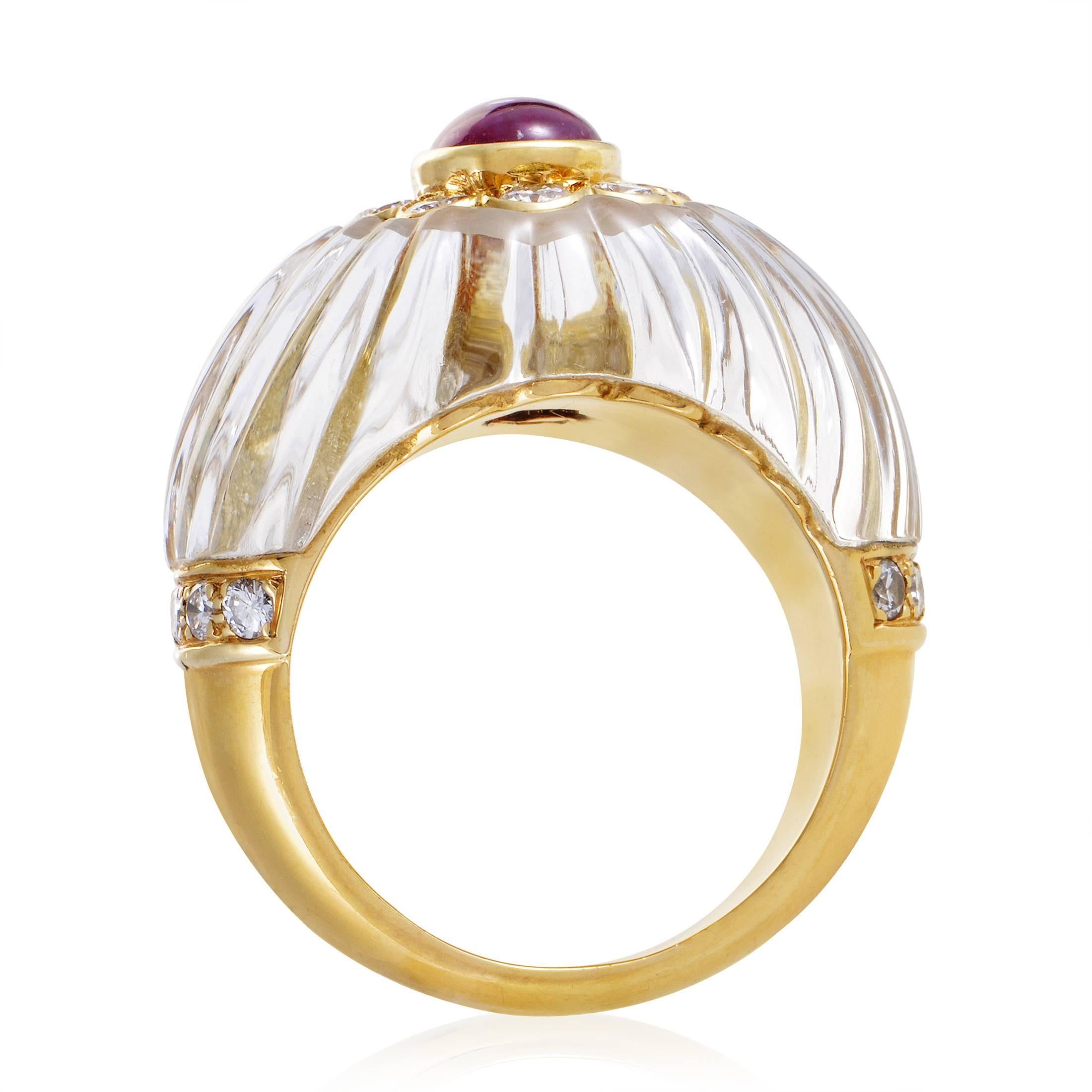 The mesmerizing crystal sets the stage perfectly for the 0.75ct of precious diamonds to shine and for the gorgeous ruby weighing approximately 1.50 carats to exude its stunning allure in this fascinating 18K yellow gold ring from Boucheron.
Ring