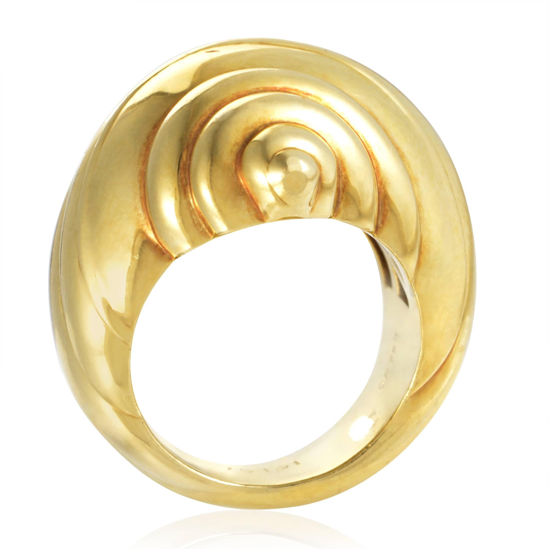Assuming the wonderfully intriguing form of a shell that allows the impeccably polished 18K yellow gold to produce stunning play of light, this exceptional ring from Chanel exudes elegant simplicity and adorable spirit.
Ring Size: 5.25 (49
