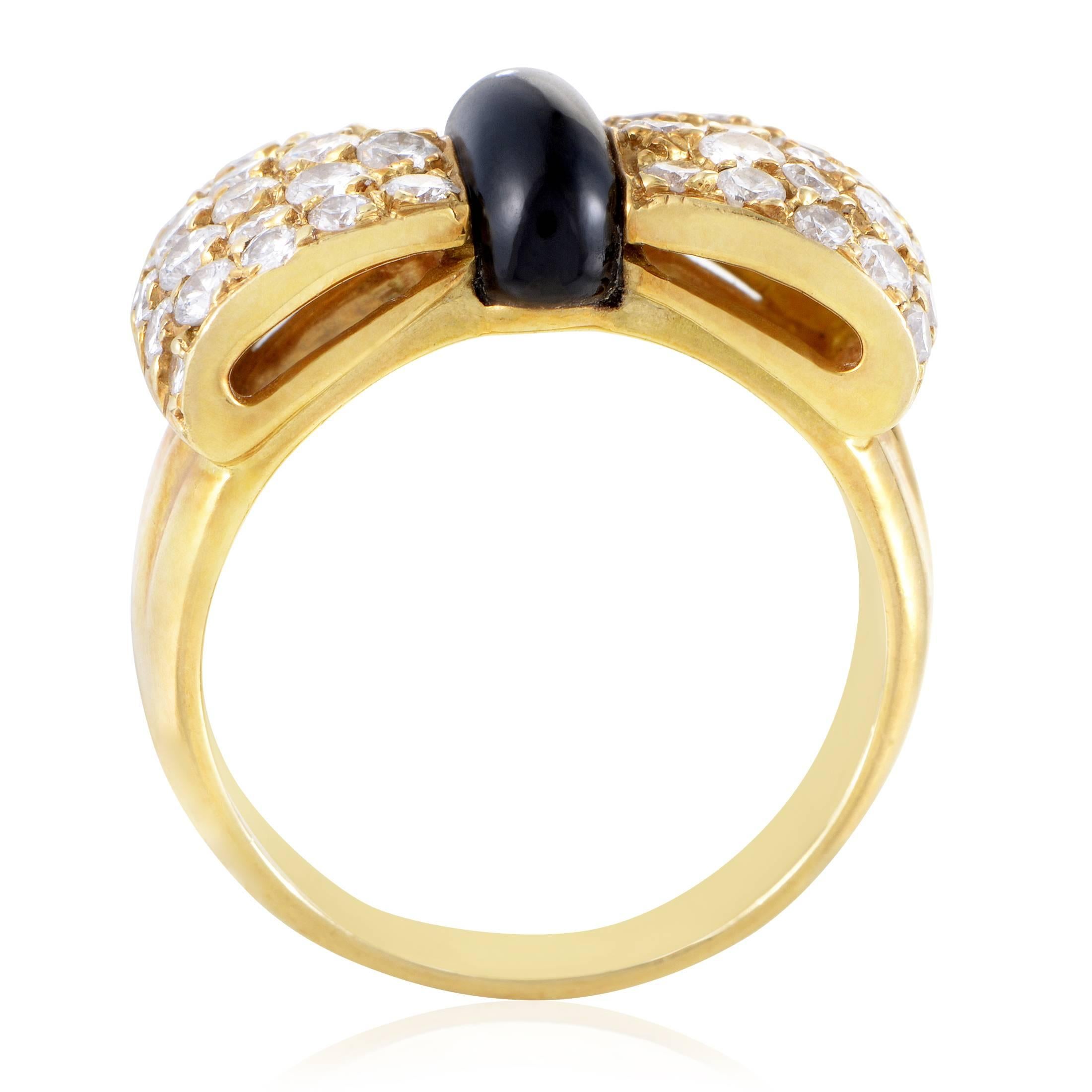 The adorable motif of a bow is presented in a wonderfully contrasting combination of stunning onyx stone and sparkling F-color diamonds of VVS clarity totaling 0.99ct in this exceptional 18K yellow gold ring from Van Cleef & Arpels.
Ring Size: 5.5