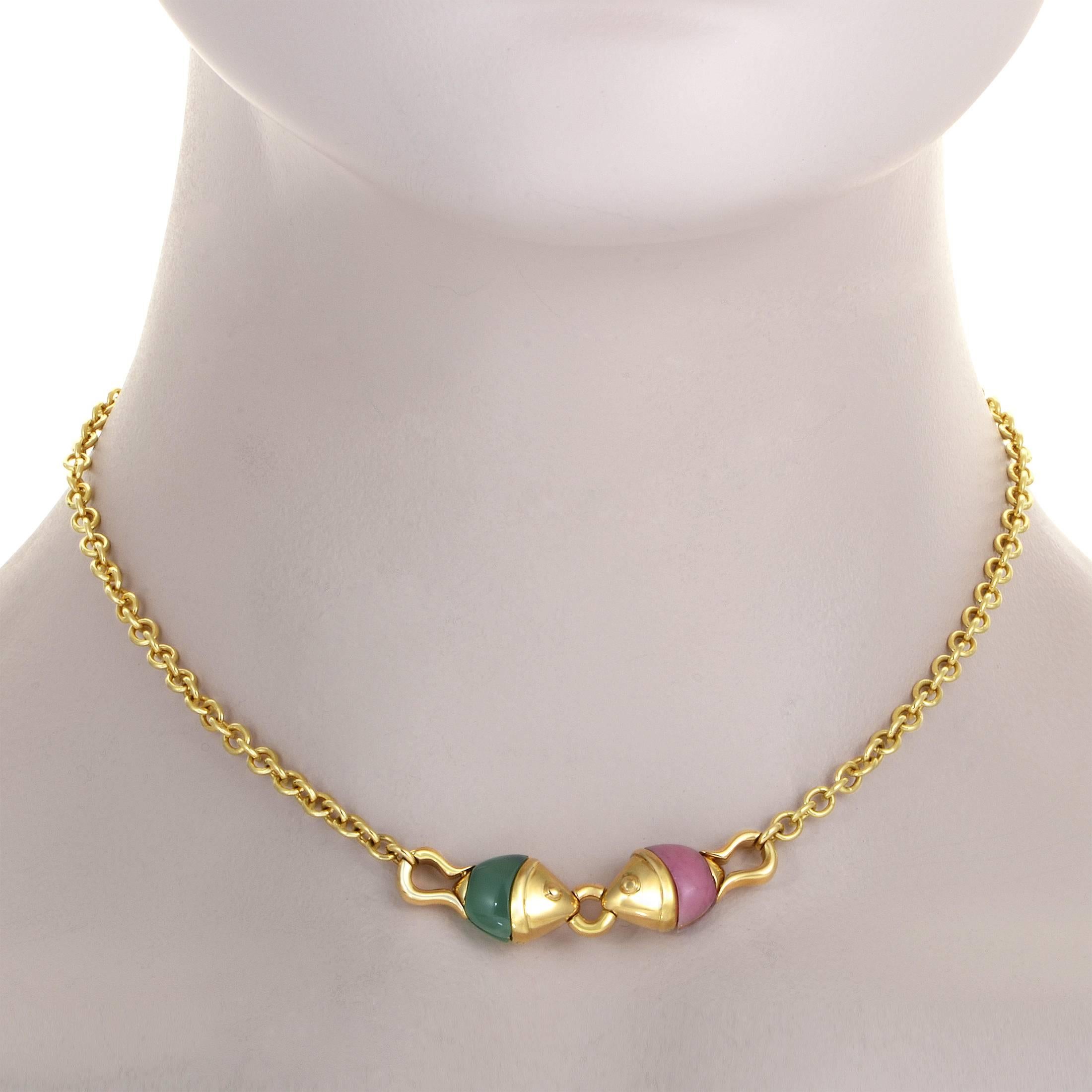 Two adorable shapes reminiscent of tiny fish are joined at the middle of this marvelous 18K yellow gold necklace from Bulgari, one embellished with a lovely pink quartz and the other with a splendid green jade for a pleasant sight.
Pendant