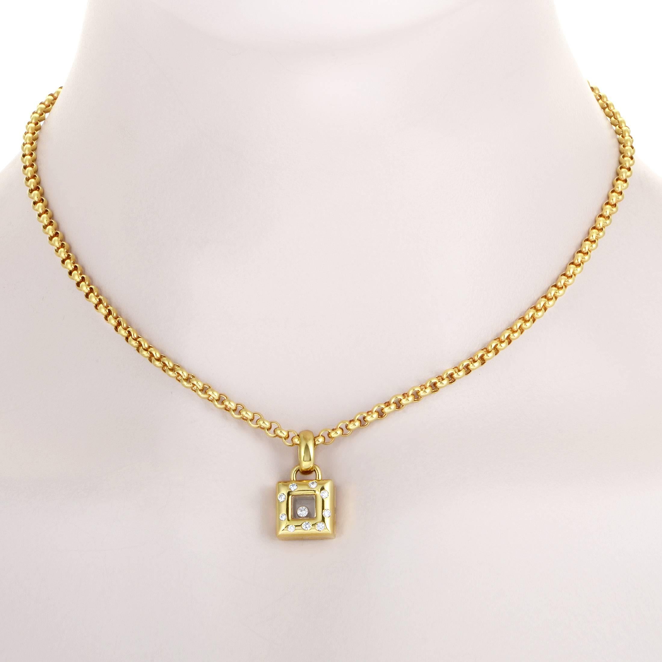 Boasting the fascinating floating diamond that has become an esteemed stand-out feature of the brand's highly revered creations, this stunning 18K yellow gold necklace from Chopard is also adorned with sparkling diamonds along the smooth surface of