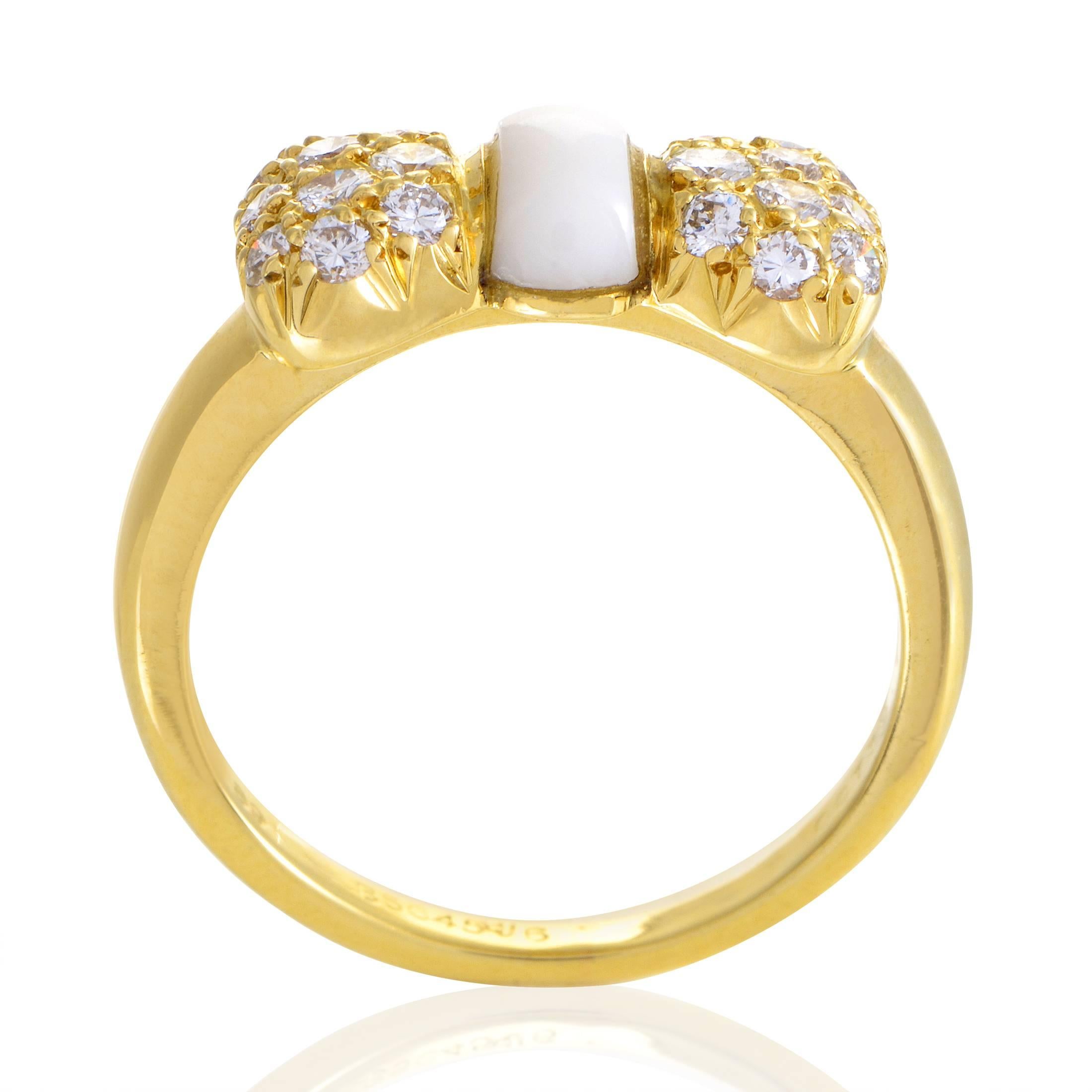 Brilliantly countering the warm radiance of 18K yellow gold and complemented by the smooth brightness of the tender white agate, lustrous diamonds totaling 0.39ct produce a scintillating allure in this adorable ring from Van Cleef & Arpels which is