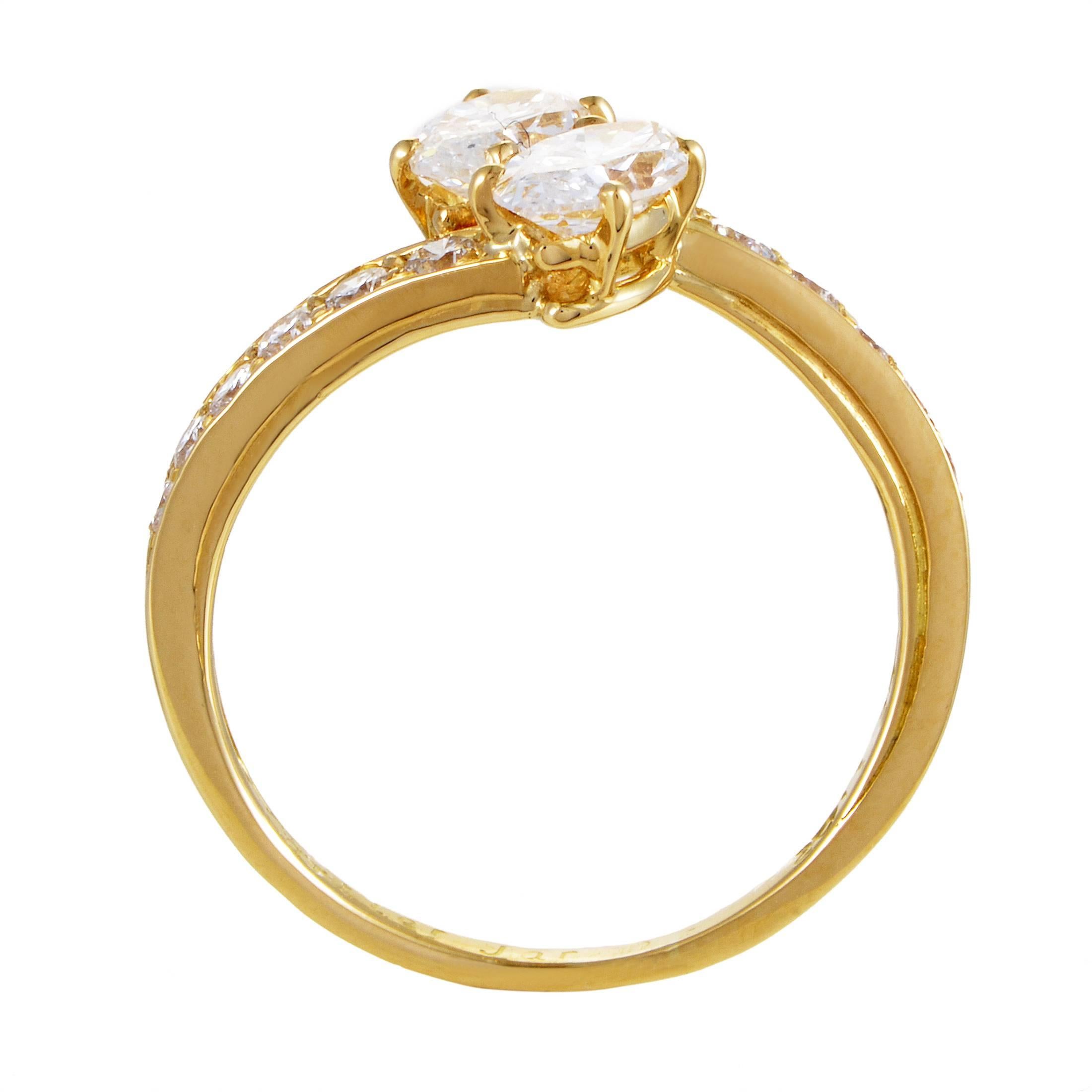 A sight of classic luxury and delightful femininity, this fabulous ring from Cartier boasts a gracefully slender body made of enchanting 18K yellow gold adorned with stunning F-color diamonds of VVS clarity weighing in total 1.25 carats.
Ring Size: