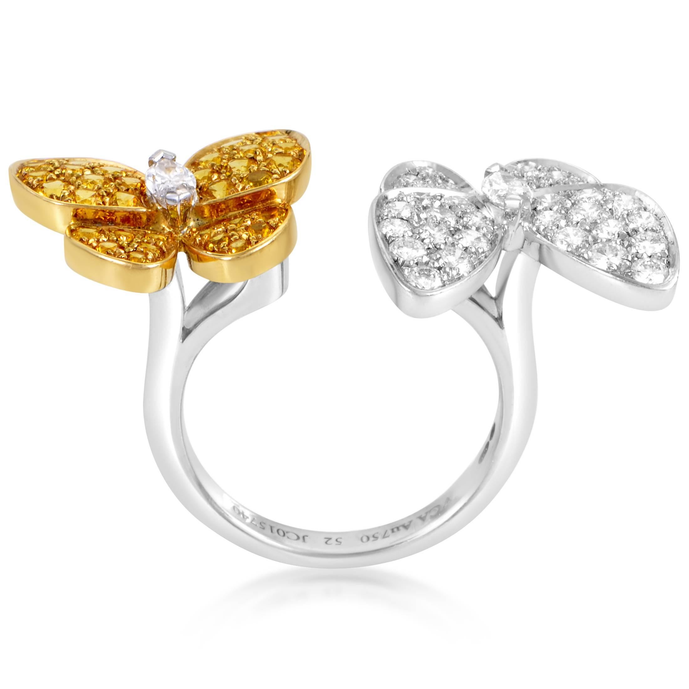Adorned with stunning D-color diamonds of VVS clarity weighing in total 0.99ct as well as gorgeous yellow sapphires totaling 0.88ct, this enchanting ring from Van Cleef & Arpels features a tasteful blend of shimmering 18K white gold and exuberant
