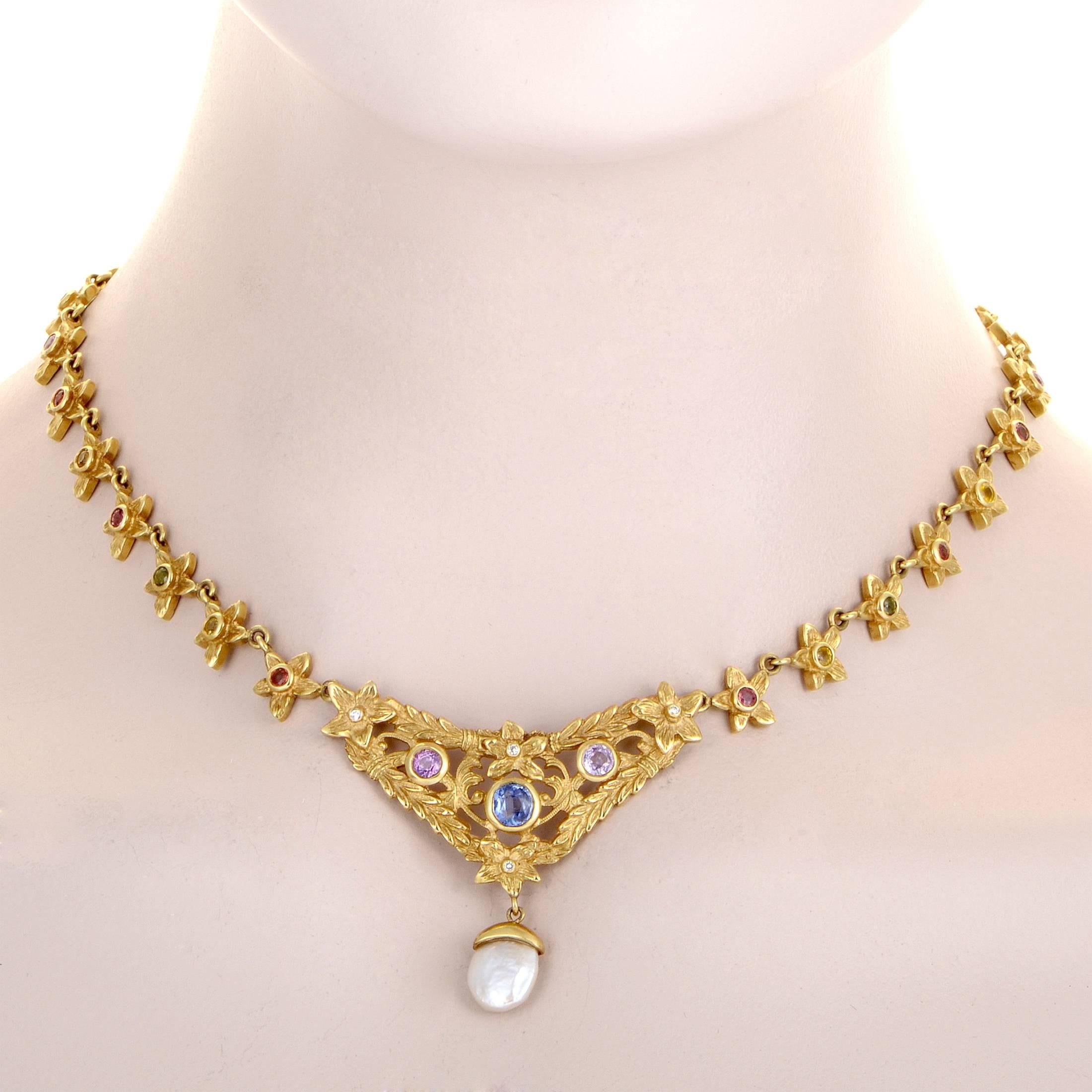 Lavishly ornate and boasting a tasteful blend of precious materials, this spellbinding necklace from Loree Rodkin is expertly crafted from 18K yellow gold and embellished with lustrous diamonds as well as numerous multicolored gems while a tender