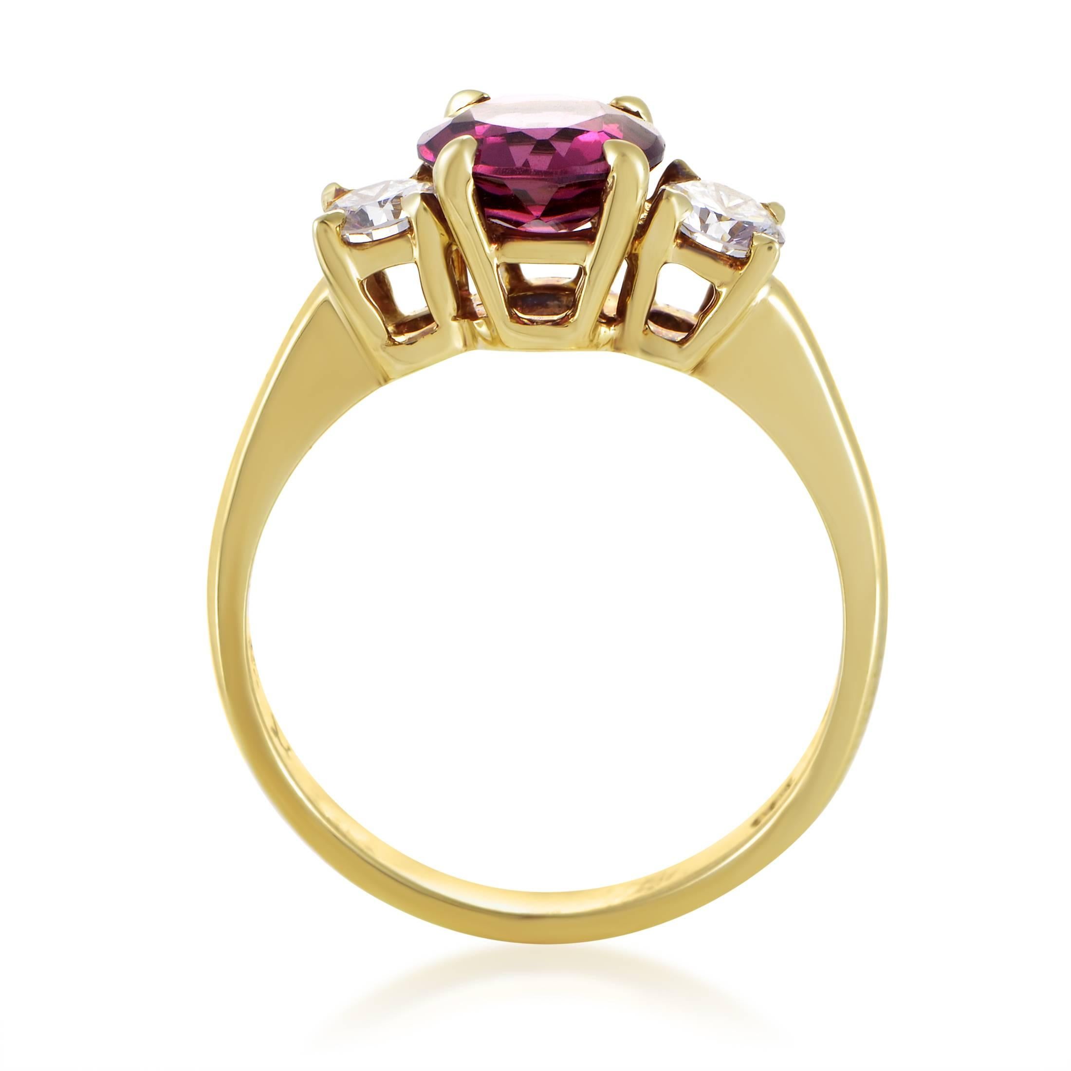Exuding its romantic nuance and exhibiting its exceptional cut upon a marvelously designed and impeccably crafted 18K yellow gold body of this stunning ring from Tiffany & Co, the enchanting tourmaline weighing approximately 1.50ct is joined by
