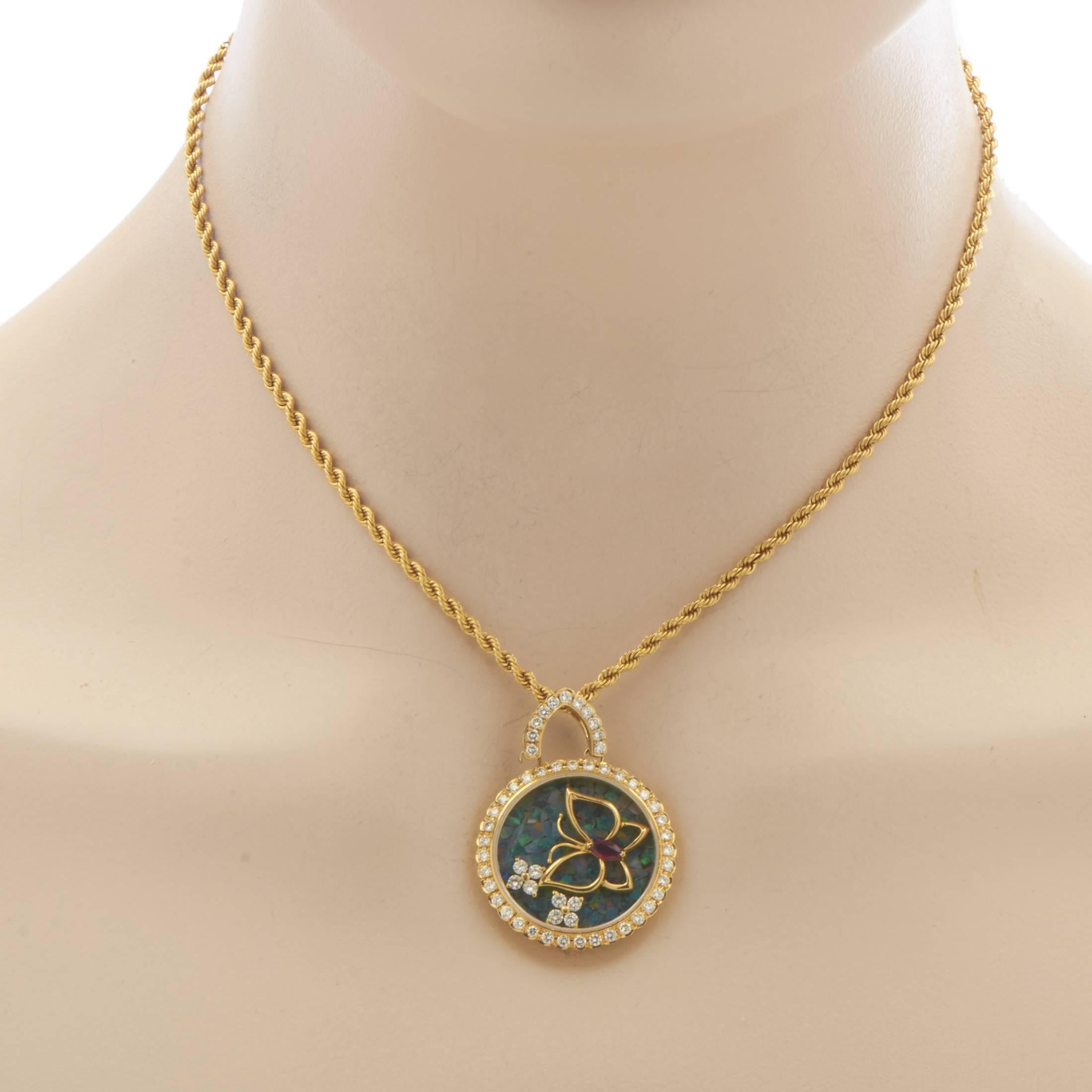 
Employing magnificent opal, a marquise cut ruby, and lustrous diamonds weighing in total approximately 1.30 carats, this exceptional 18K yellow gold necklace from Waltham boasts spellbinding décor that centers around the adorable butterfly motif