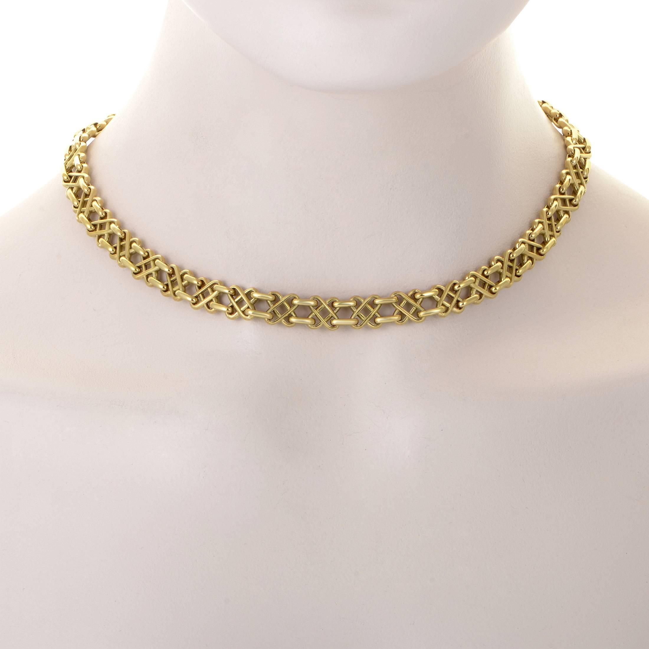 Magnificent elegance and fabulous radiance captivate at the very first sight while the amazingly intricate design and exquisite craftsmanship are revealed upon a closer look at this remarkable 18K yellow gold necklace from Tiffany & Co.
Included
