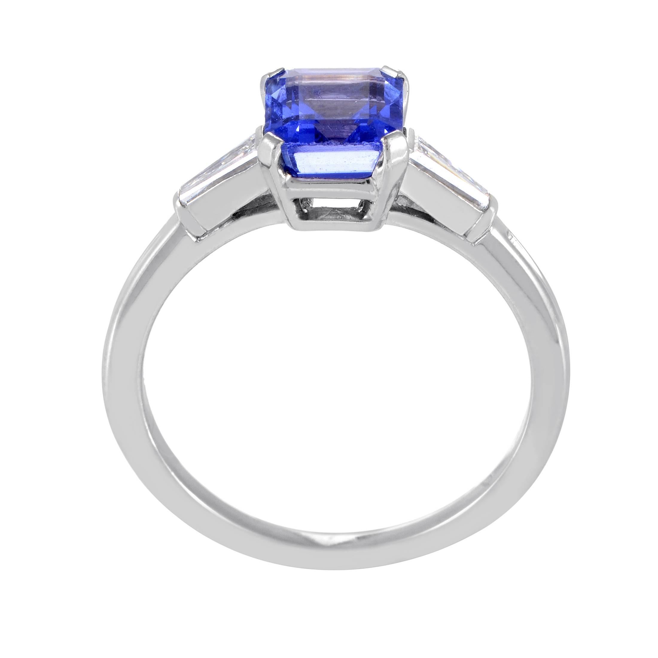Exuding prestigious excellence and tasteful elegance with its every aspect, this magnificent ring from Tiffany & Co. is made of precious platinum adorned with 0.20ct of sparkling diamonds and topped off with a majestic tanzanite that weighs 1.10