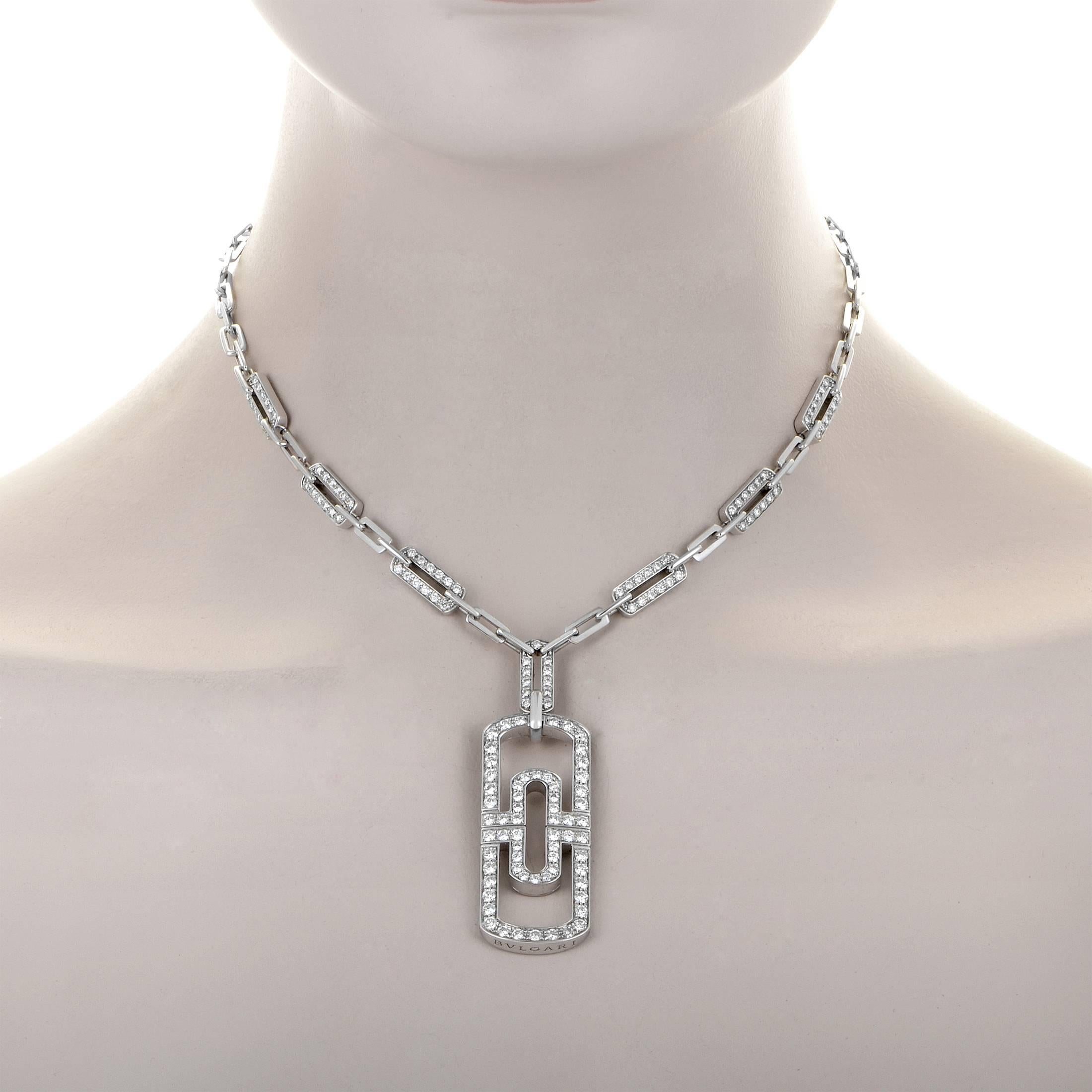 This authentic design from Bulgari's Parentesi collection is perfect for the lady who loves to shine! The necklace is made of 18K white gold and boasts a large pendant that features the Parentesi design. Lastly, the necklace and pendant are set with