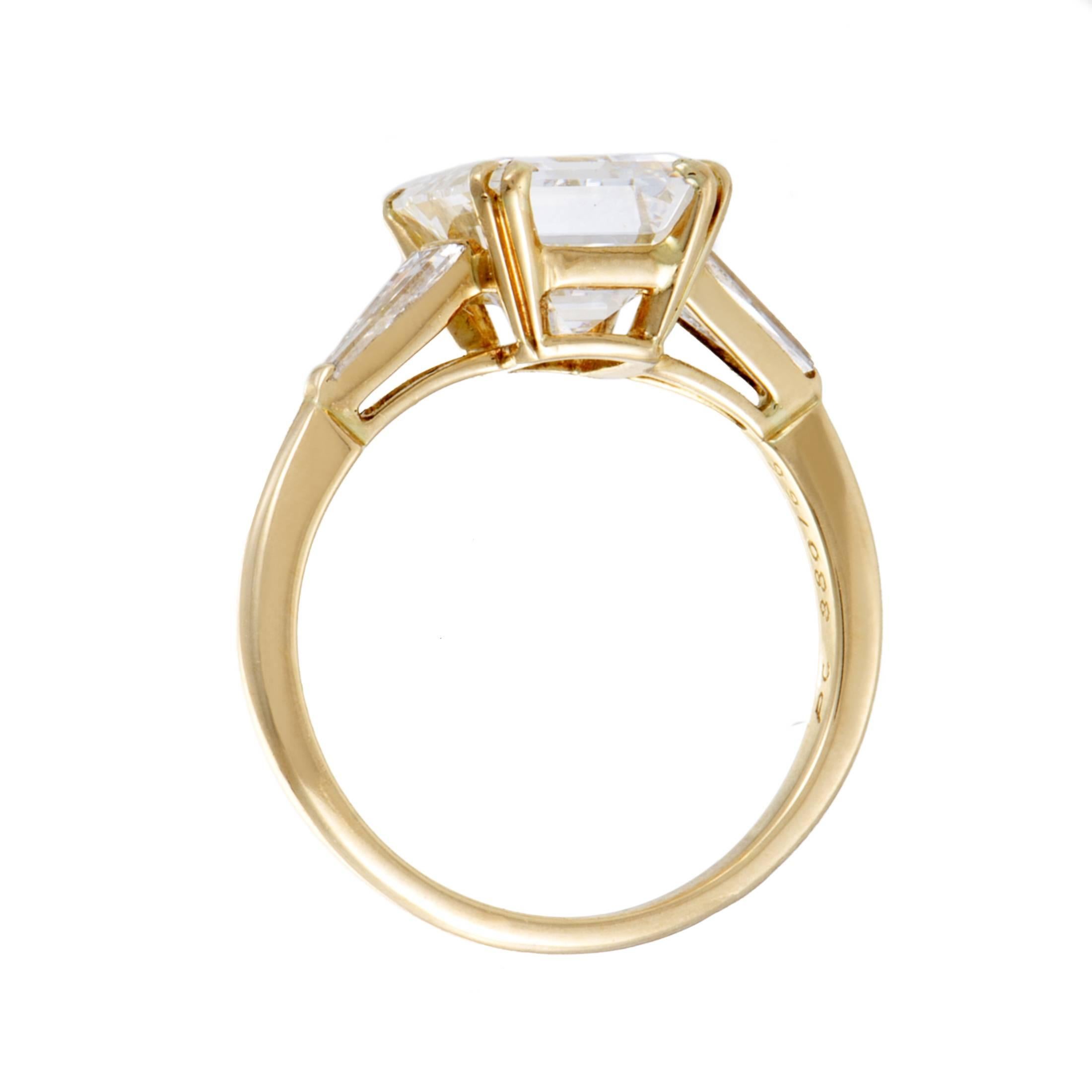 An item of immense quality and exceptional prestigious allure, this truly fascinating engagement ring from Boucheron is made of unblemished 18K yellow gold and adorned with an astonishing and exquisitely cut, GIA-certified, E-color diamond of