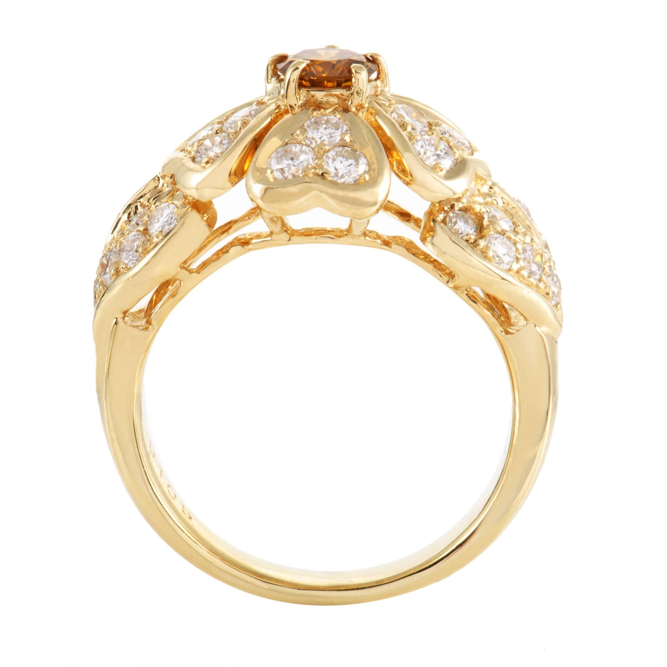 Boasting a gorgeous orange diamond weighing 0.34ct upon a spellbinding backdrop comprised of prestigious 18K yellow gold and white GH-colored diamonds of VS clarity totaling 1.05 carats, this fascinating ring is a dazzling sight to behold.
Ring