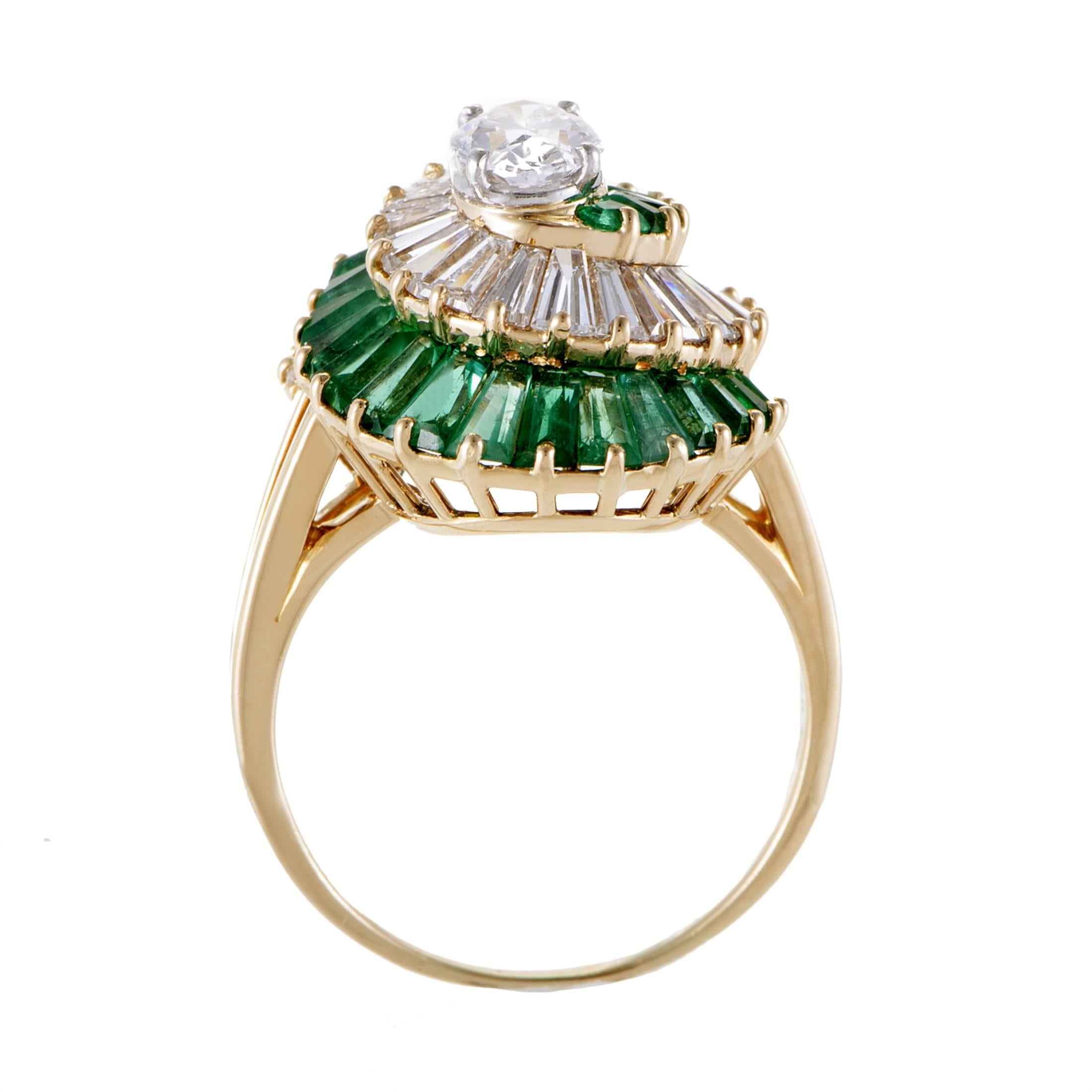 Spiraling gracefully upwards to uphold the magnificent G-color central diamond of VS clarity weighing approximately 0.83ct, charming emeralds totaling 1.70 carats and glistening diamonds amounting to 1.75 carats create a wonderful sight in this