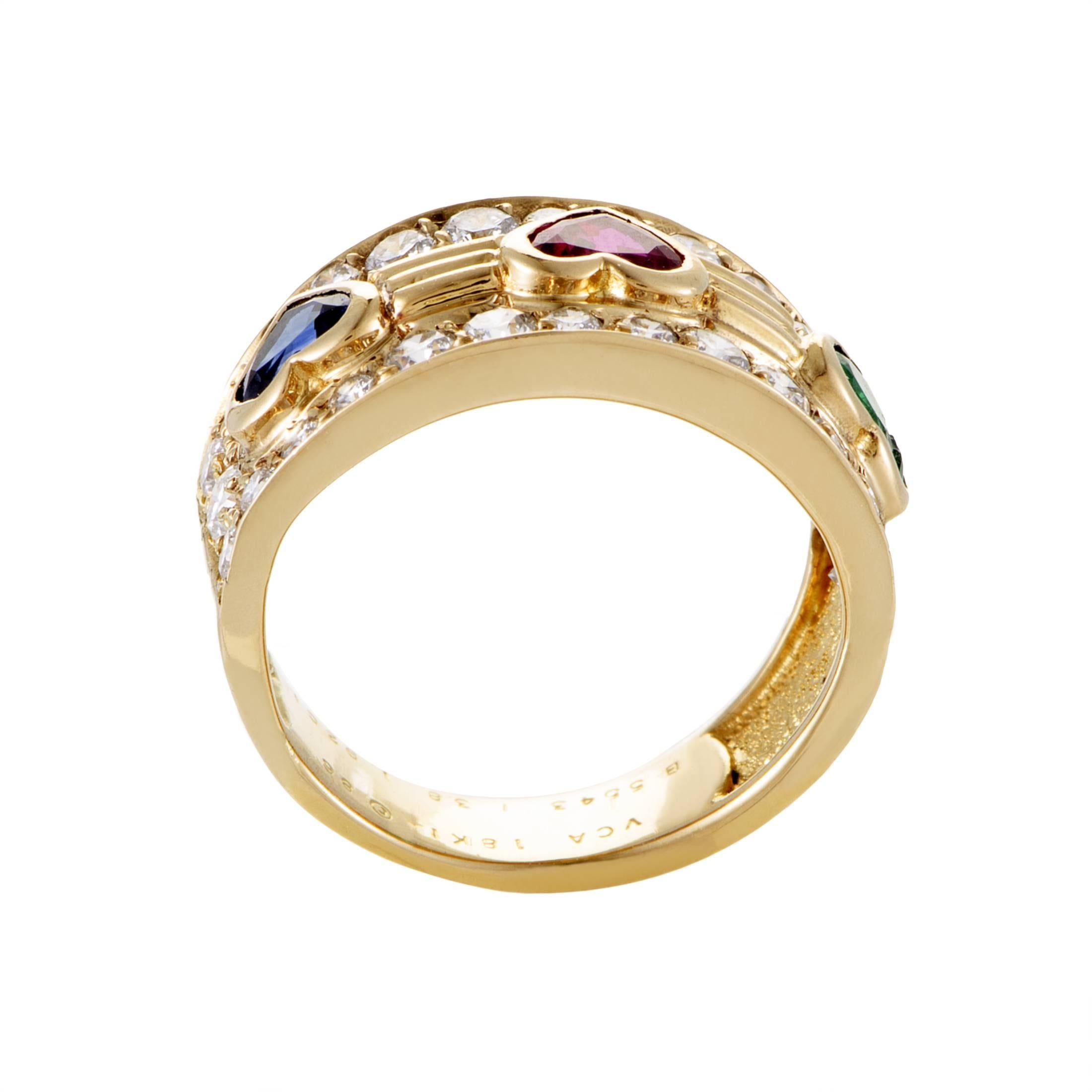 Employing marvelous precious stones for adorable heart-shaped decorations, Van Cleef & Arpels present this spellbinding ring made of 18K yellow gold and embellished with lustrous diamonds along with the lovely ruby, gorgeous emerald and stunning