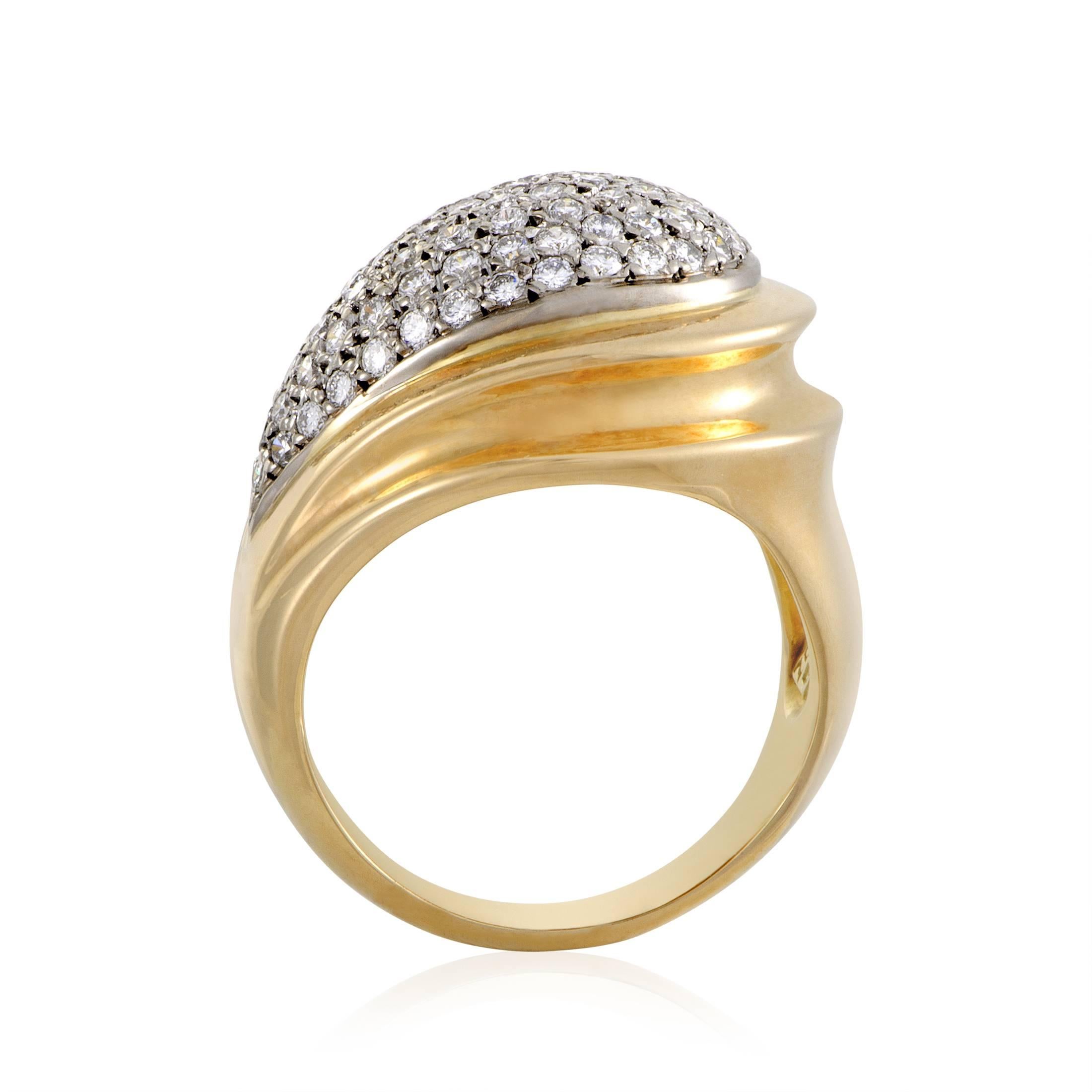 Arranged in a fascinating manner to produce a dazzling effect, the resplendent diamonds weighing in total approximately 1.00 carat are placed against 18K white gold in this exquisite 18K yellow gold ring from Zolotas. 
Ring Top Dimensions: 24 x 21
