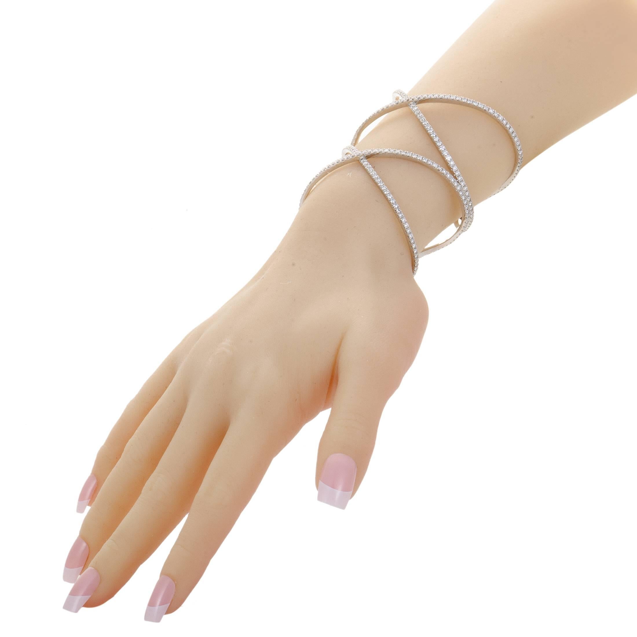 Elegant simplicity and graceful lines produce a delightful allure in this sumptuous bracelet from Dena Kemp which is expertly crafted from splendid 18K white gold and neatly lined with FG-color diamonds of VS clarity weighing in total 8.71