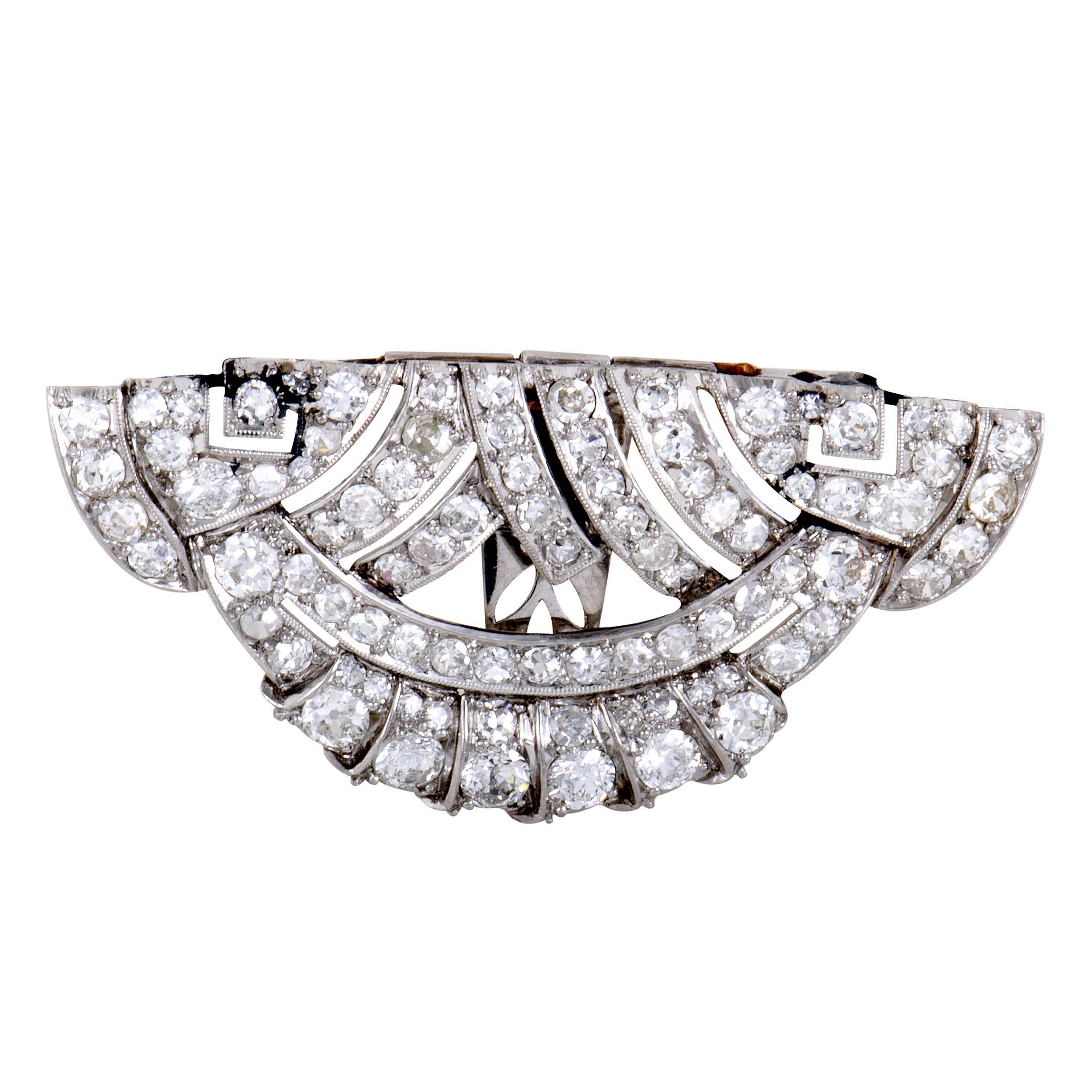 Resplendent prestige and exceptional ornamentation meet in these fascinating clips which are made of expertly crafted platinum and set with lustrous diamonds weighing in total approximately 8.00 carats for an astonishing sight.