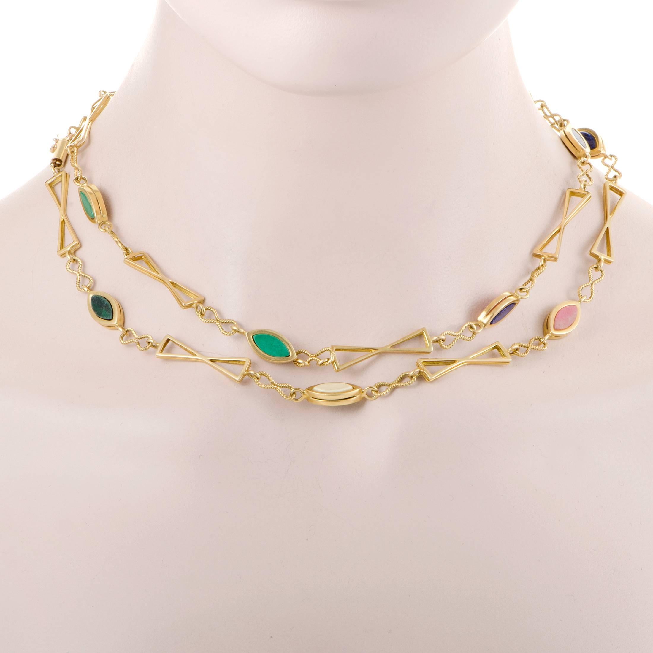 Pleasant pastel colors of lapis lazuli, malachite and splendid coral stones produce a delightful allure in this enchanting 18K yellow gold necklace which also boasts an intriguing shape for a sight of gorgeous feminine luxury.