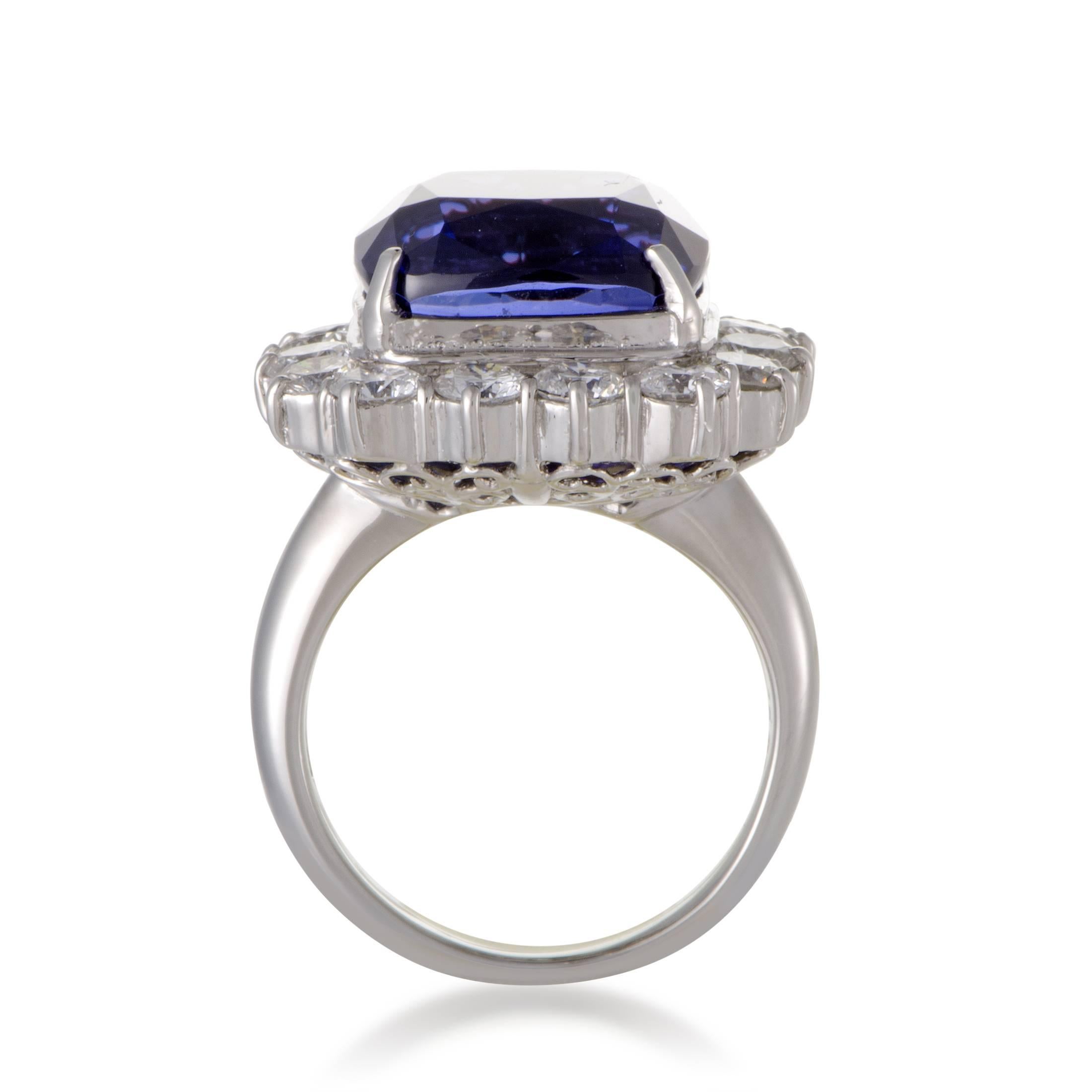 Compelling with its exquisite cut, exceptionally fine color and clarity, the amazing tanzanite stone brings fantastic color into this magnificent platinum ring that also boasts 2.54 carats of sparkling diamonds.
Ring Top Dimensions: 22 x 20mm
Ring