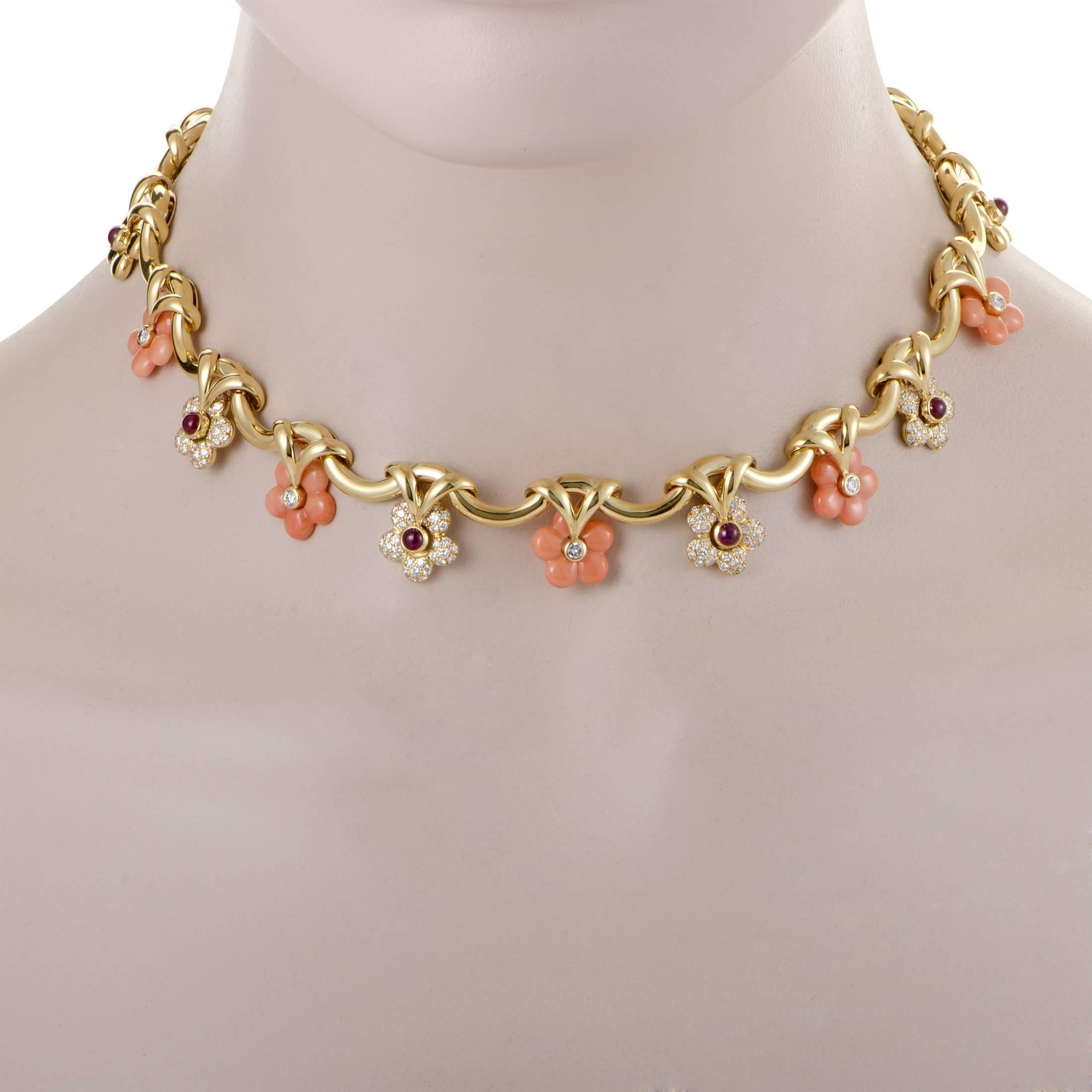 Producing a delightfully feminine tone by combining tender coral stone and fabulous rubies totaling 3.54 carats, this gorgeous 18K yellow gold necklace is also embellished with 2.39 carats of scintillating diamonds.
