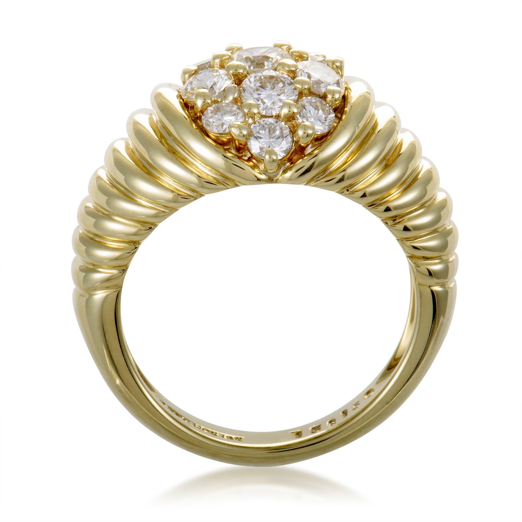 Placed upon a fantastically designed and expertly crafted body of precious 18K yellow gold, lustrous diamonds amounting to 1.35 carats are arranged in a tantalizing manner in this lavish ring from Jose Hess that exudes an aura of luxurious