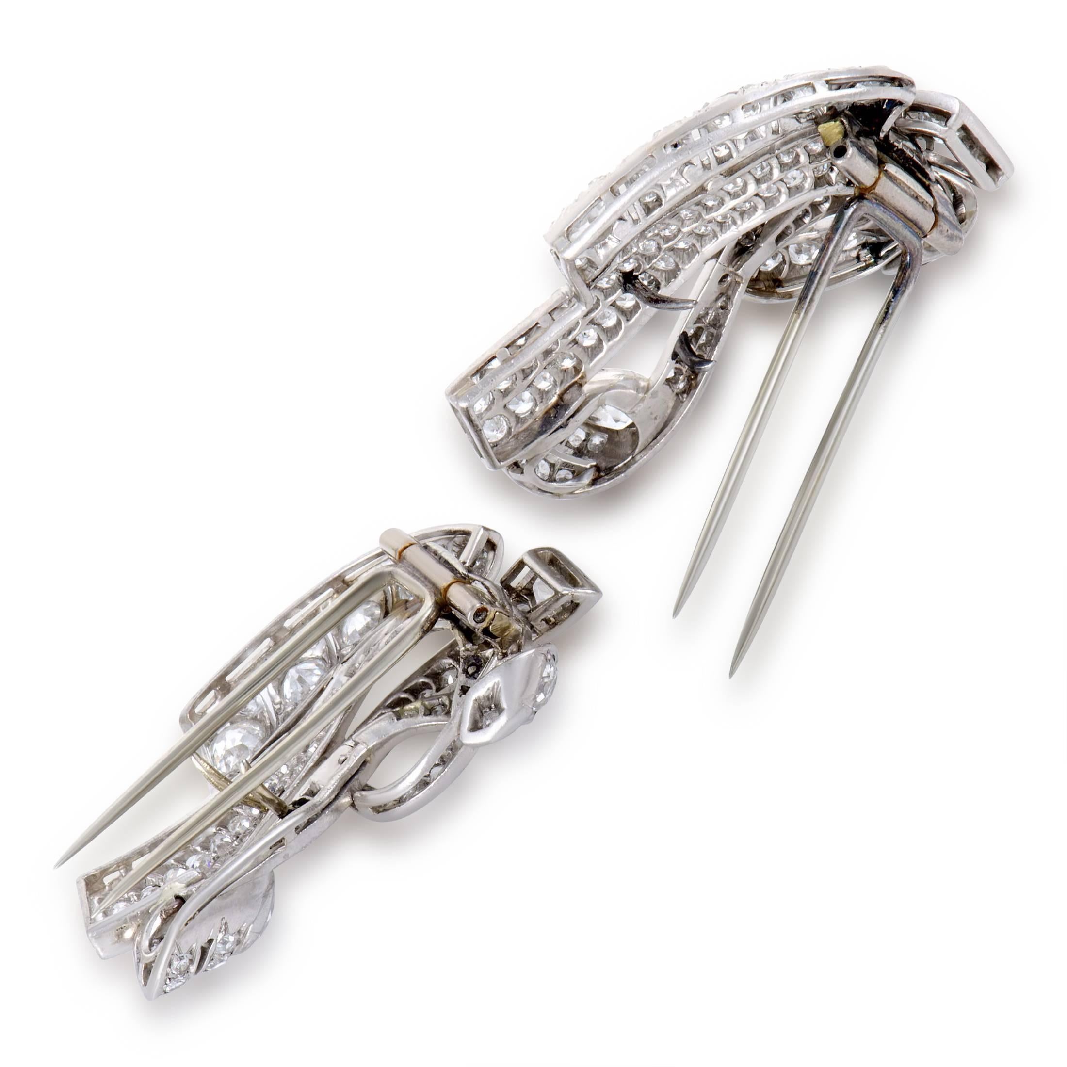 Lavishly embellished with lustrous diamonds weighing in total approximately 8.50 carats, these stylish pins are exquisitely made of platinum and boast graceful motifs which produce an adorable allure in a wonderfully harmonious setting.