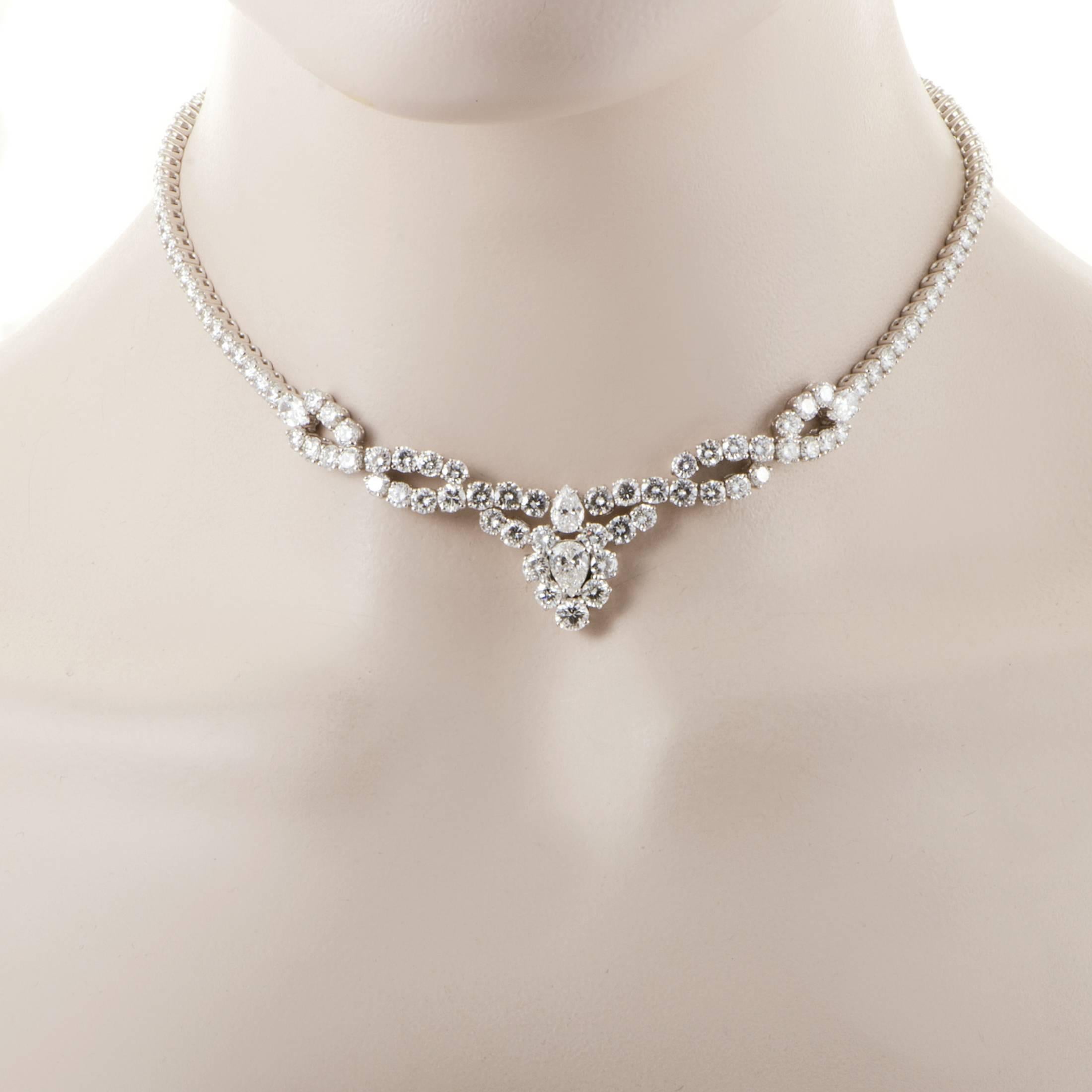 A spellbinding embodiment of unblemished prestige and lavish elegance, this astonishing necklace from Dior is exquisitely crafted from 18K white gold and adorned with resplendent F-color diamonds of VVS clarity weighing in total staggering 21.00