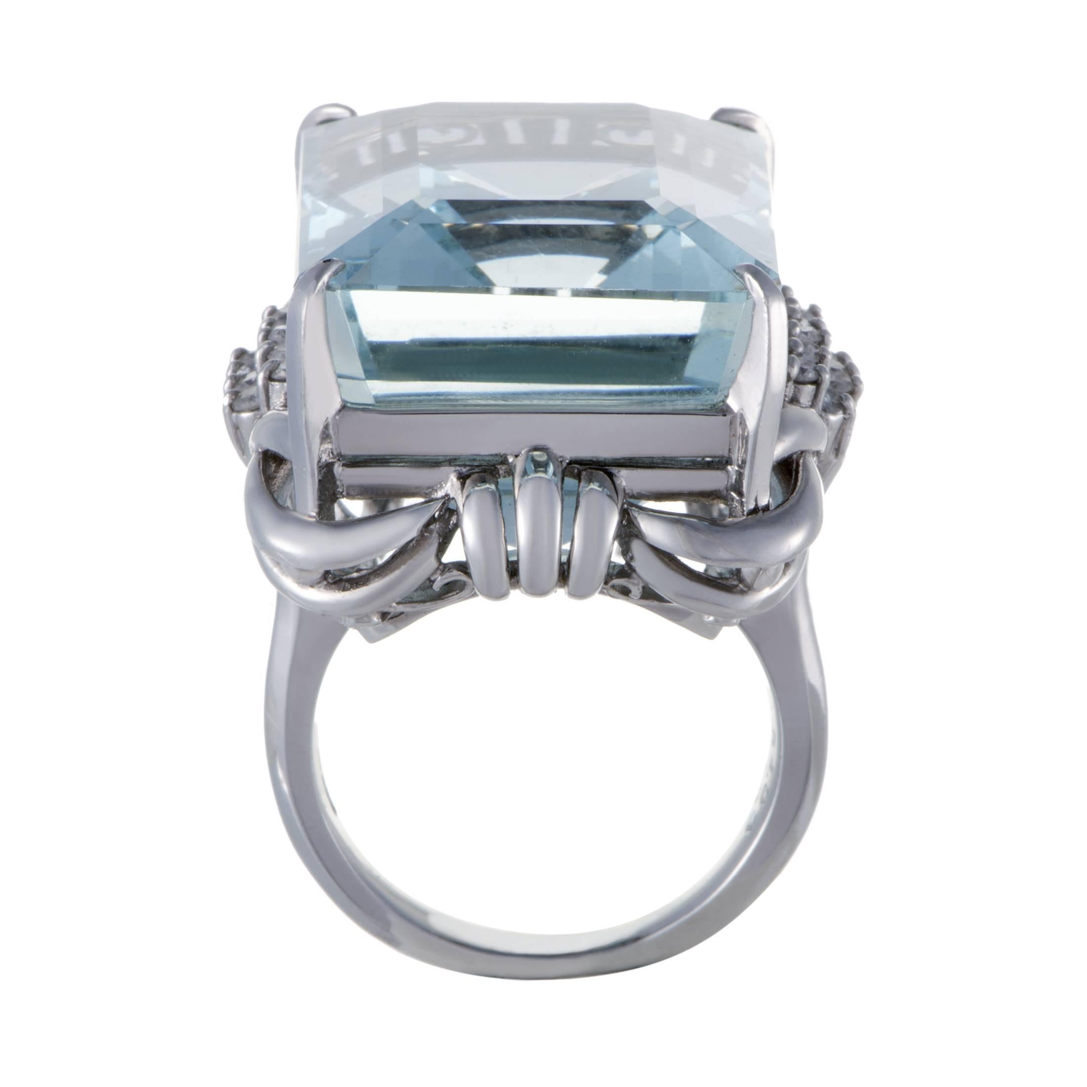 Exquisite ornamentation of prestigious platinum, brilliant luster of diamonds amounting to 0.32ct and spellbinding glisten of the majestic aquamarine weighing 54.00 carats all contribute to the astonishing appearance of this sublime ring that offers