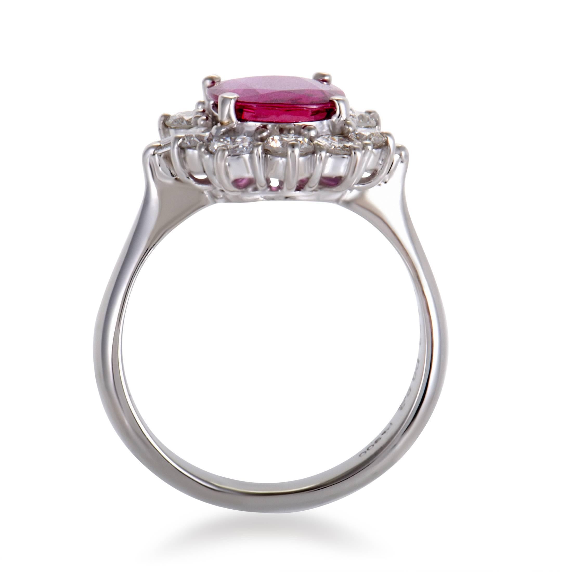 Brilliantly complemented by the wonderfully bright backdrop of splendid platinum and sparkling diamonds amounting to 0.93ct, the astonishing ruby weighing 1.45 carats produces majestic allure in thus aesthetically sublime ring.
Ring Top Dimensions: