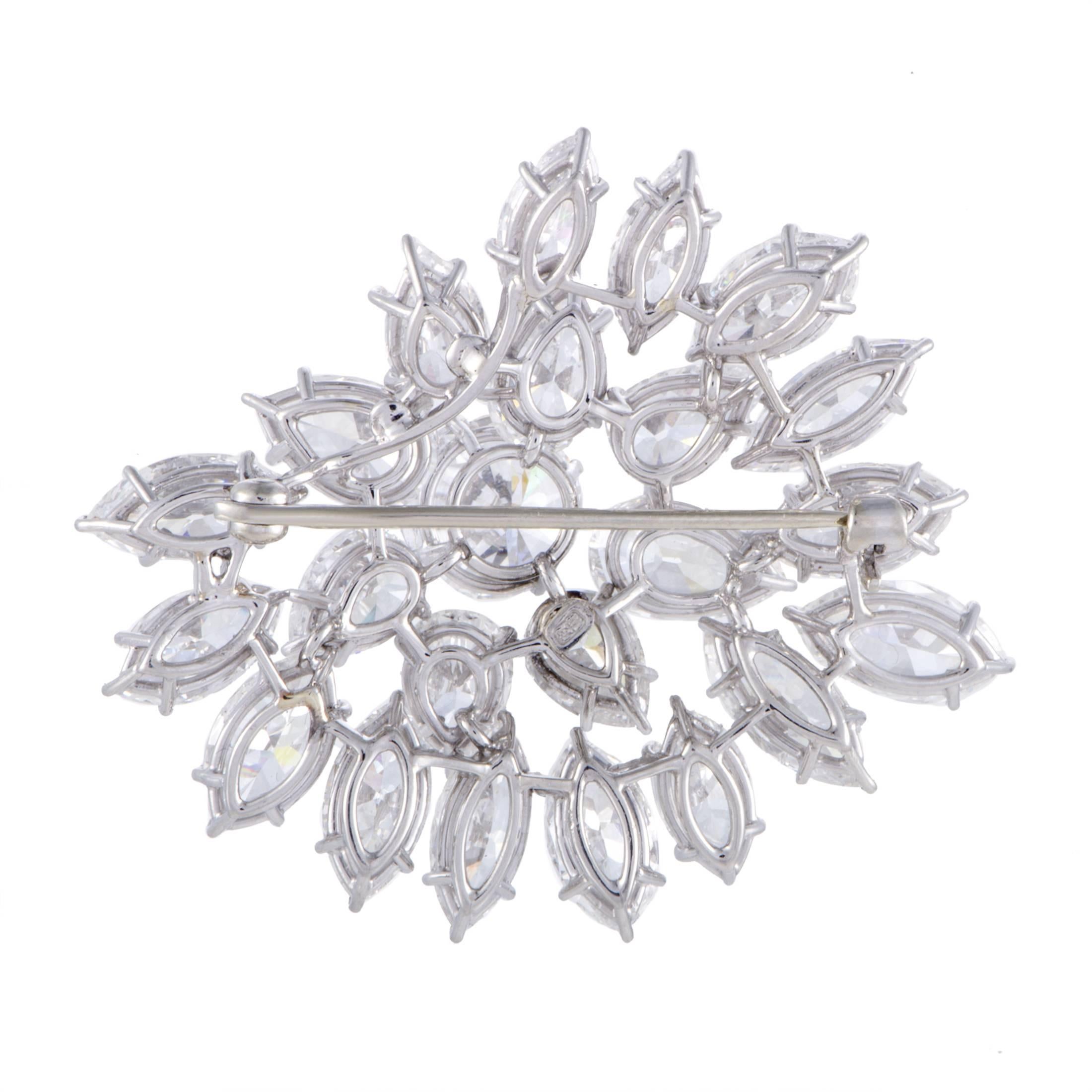 
Showcasing their fascination with diamonds, excellence and elegance, Harry Winston created this extraordinary platinum brooch that places focus on the glorious resplendence of mesmerizing diamonds of which the D-color central stone of VS1 clarity