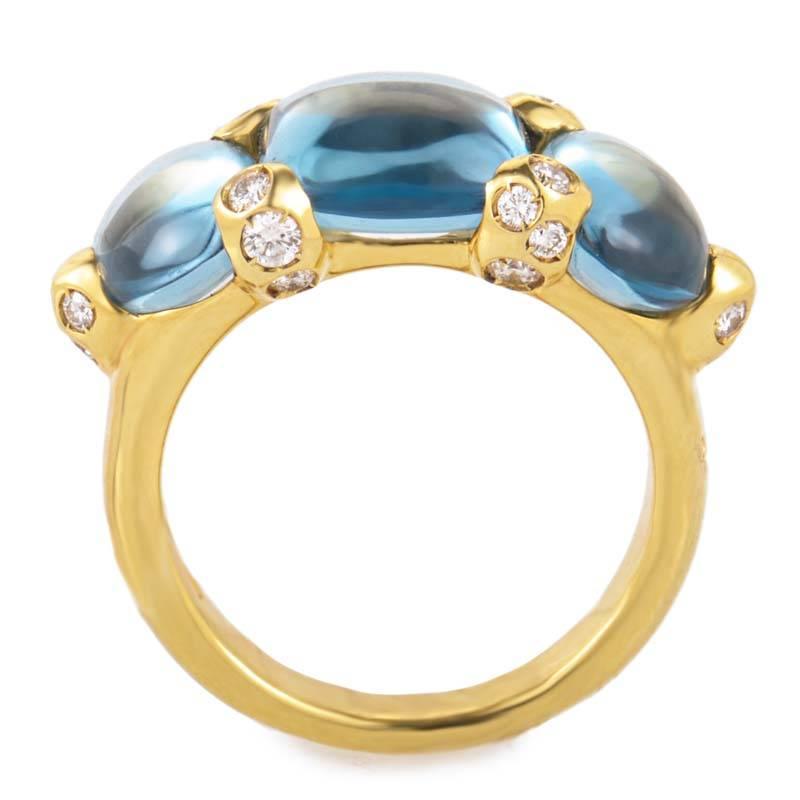 This ring from Pomellato has beautiful coloring that would perfectly accentuate an equally vibrant outfit. It is made of 18K yellow gold and is set with three topaz cabochons. Lastly, the colored stones are accented with ~.36ct of diamonds.
Included