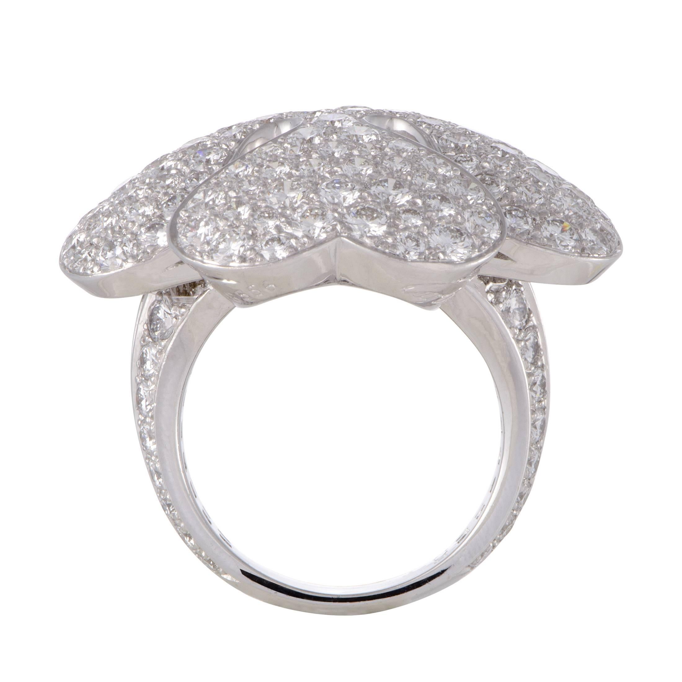 Mesmerizing, harmonious and simply stunning, this exceptionally lavish ring from Cartier is a limited edition item that depicts a marvelous four-leaf clover motif in a precious blend of shimmering 18K white gold and sparkling diamonds totaling 10.00