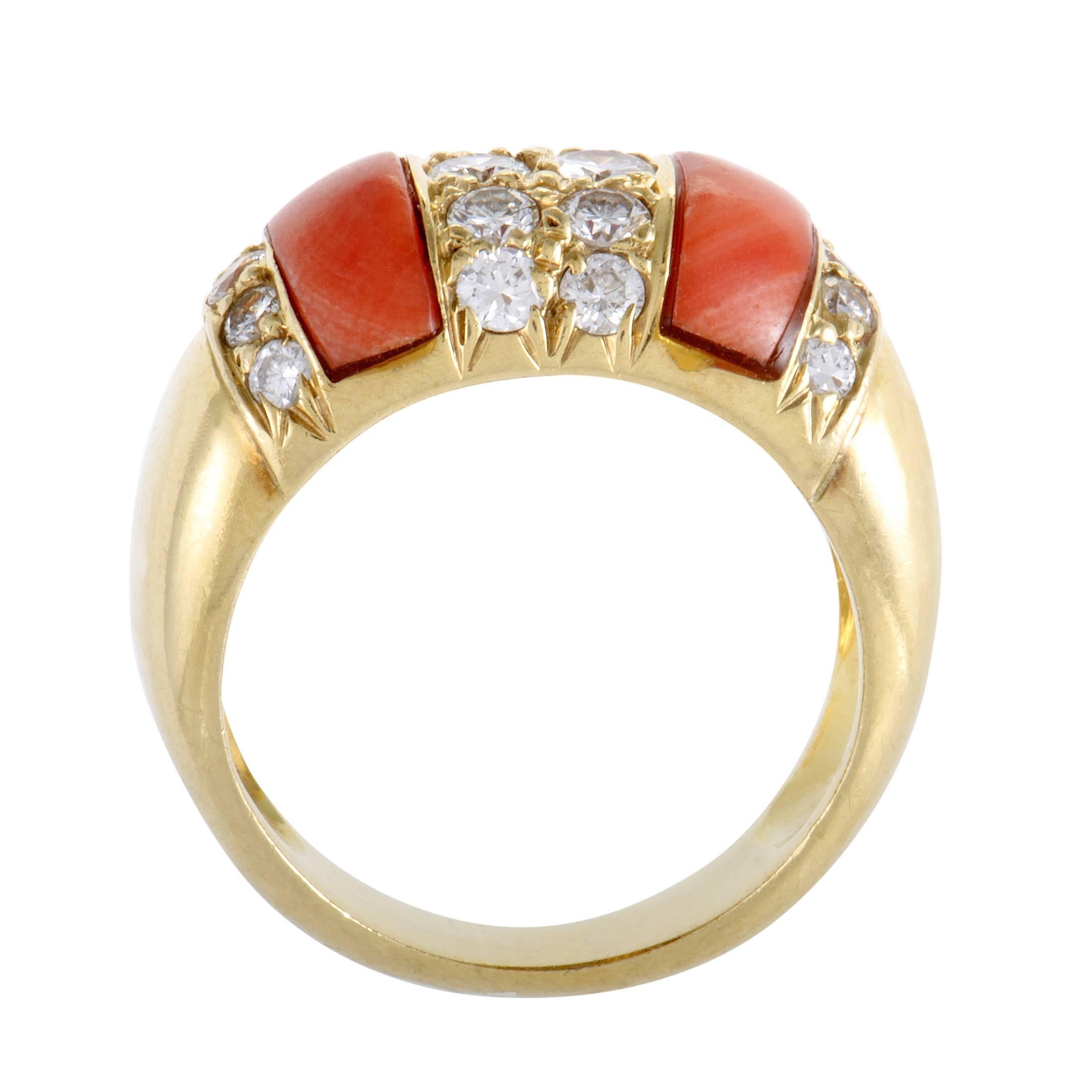Neatly inlaid amidst a scintillating arrangement of glistening diamonds amounting to 1.00 carat, the striking coral stones exude their passionate color against the radiant 18K yellow gold in this vivacious and tasteful ring.
Ring Size: 6.75
Band
