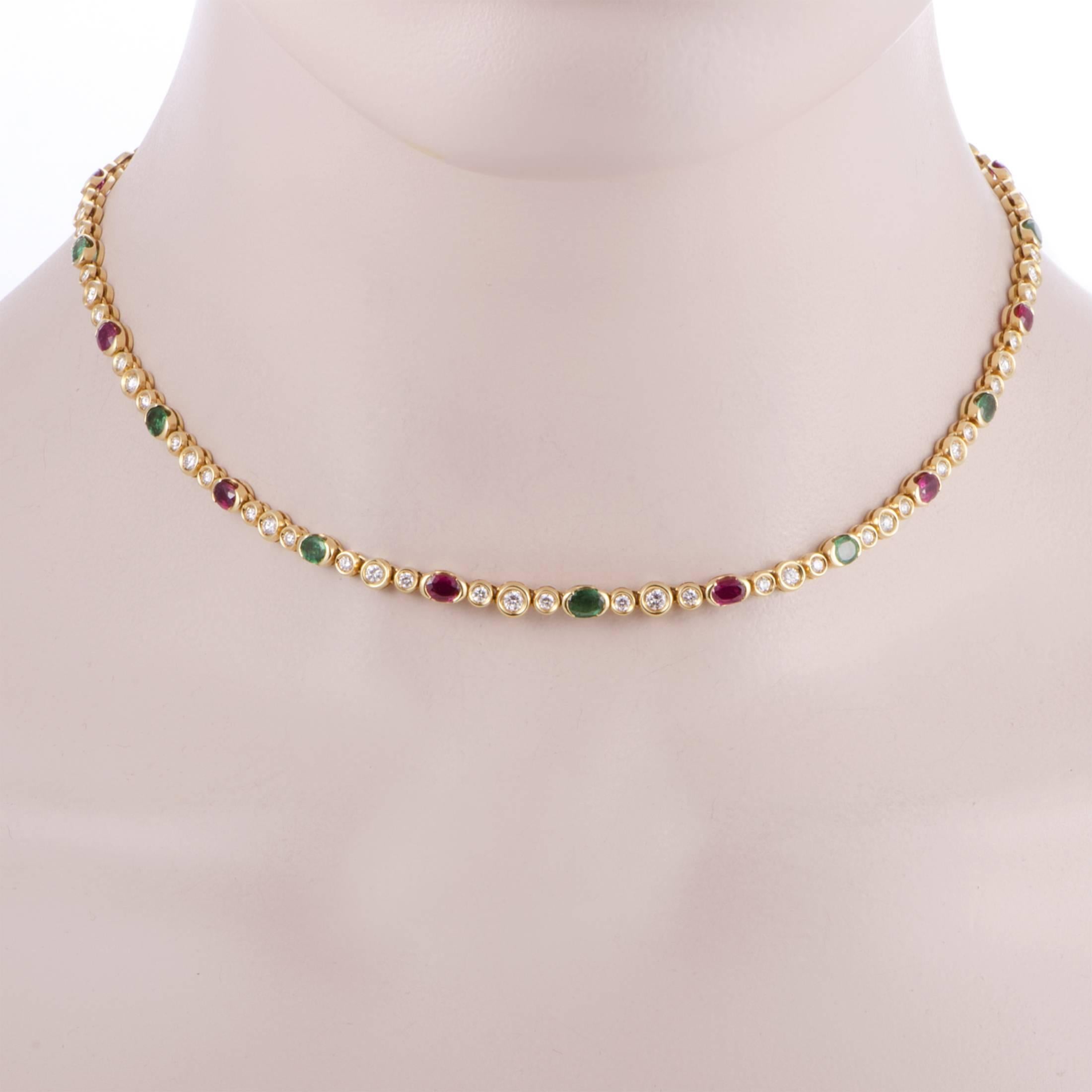 Neat and scintillating, the charming arrangement of diamonds amounting to 2.75 carats is interspersed with precious emeralds weighing in total 4.40 carats and fabulous rubies totaling 4.00 carats in this elegant 18K yellow gold necklace from Fred of