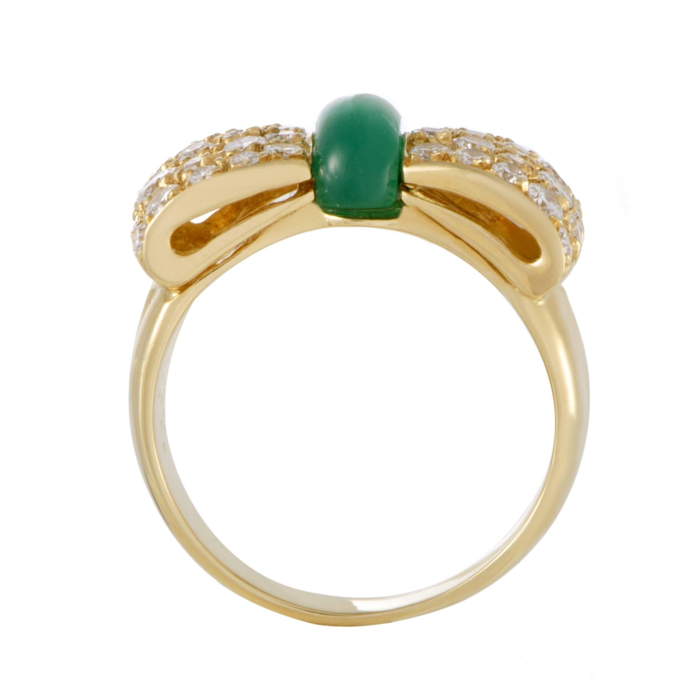 Designed in the appealing shape of a bow and offering vivid color through the marvelous green chrysoprase stone, this nifty ring from Van Cleef & Arpels is made of precious 18K yellow gold and set with sparkling diamonds totaling 0.99ct.
Ring