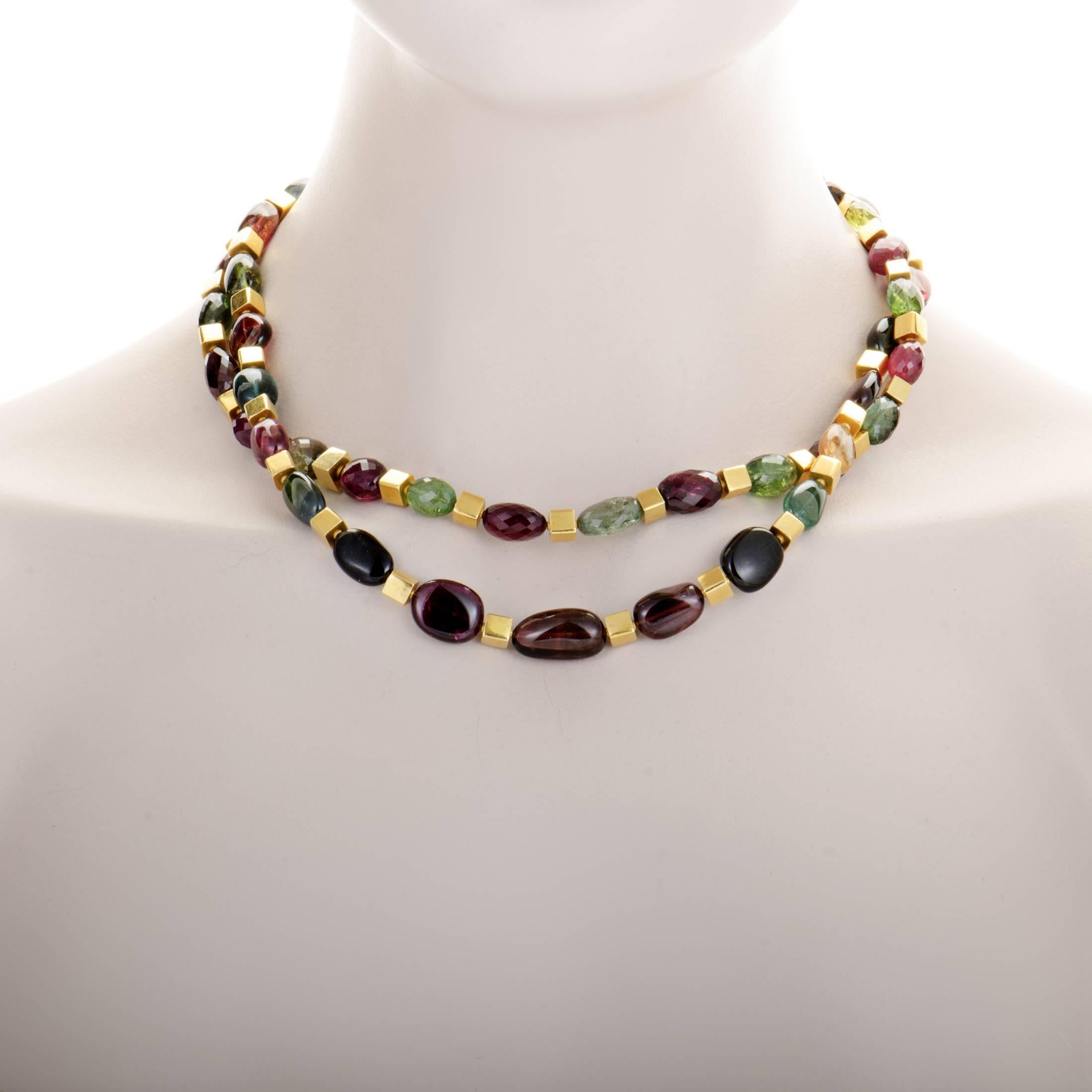 Enriching the fabulous nuance of prestigious 20K yellow gold with vivacious colors of diversely toned tourmaline stones, this magnificent necklace offers a sight of tasteful flamboyance, exuberant femininity and offbeat style.