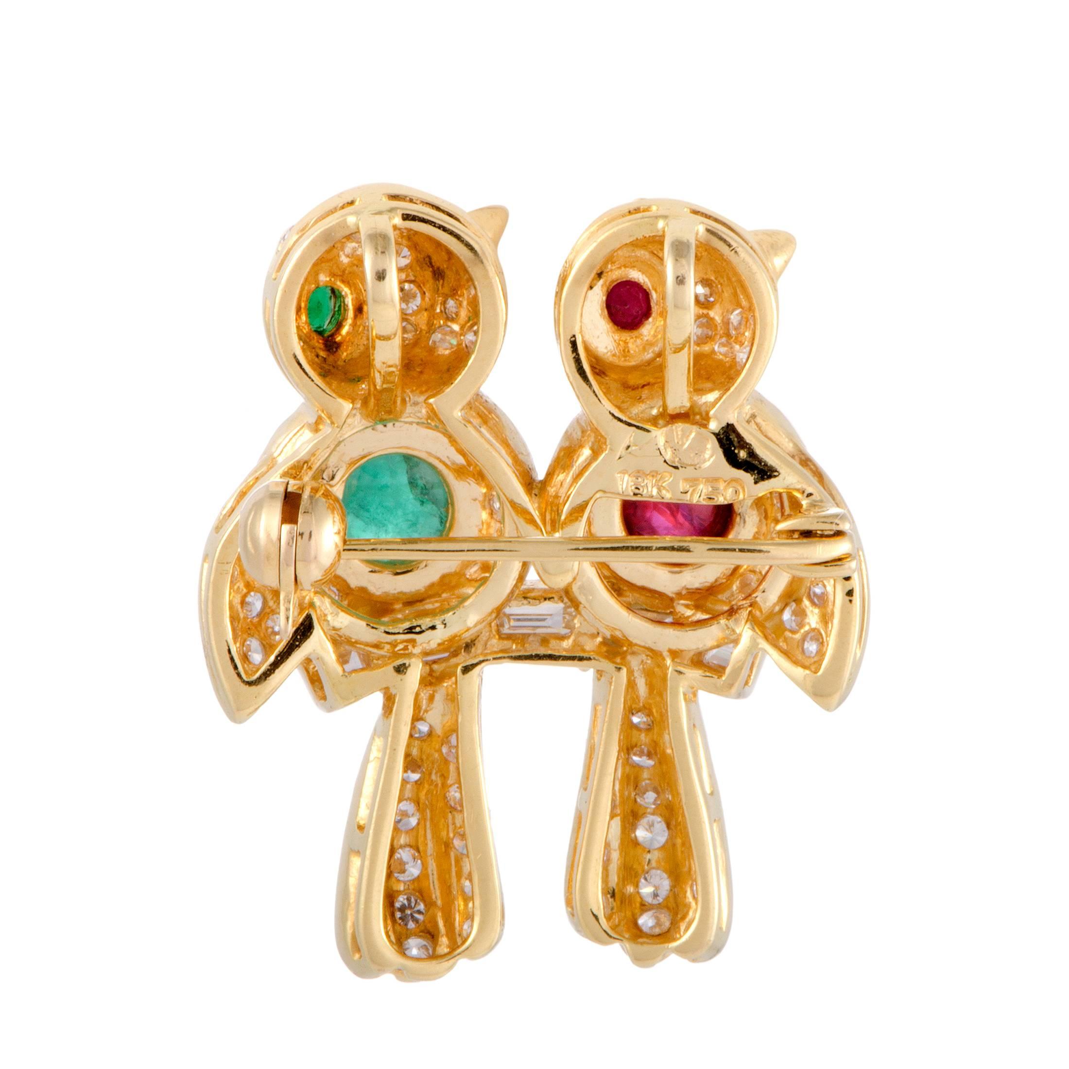 Bringing vivid color into a design of glamorous radiance, this exceptional 18K yellow gold brooch charmingly depicts cheerful birds by employing 0.55ct of rubies and 0.60ct of emeralds as well as 1.35 carats of glittering diamonds.
