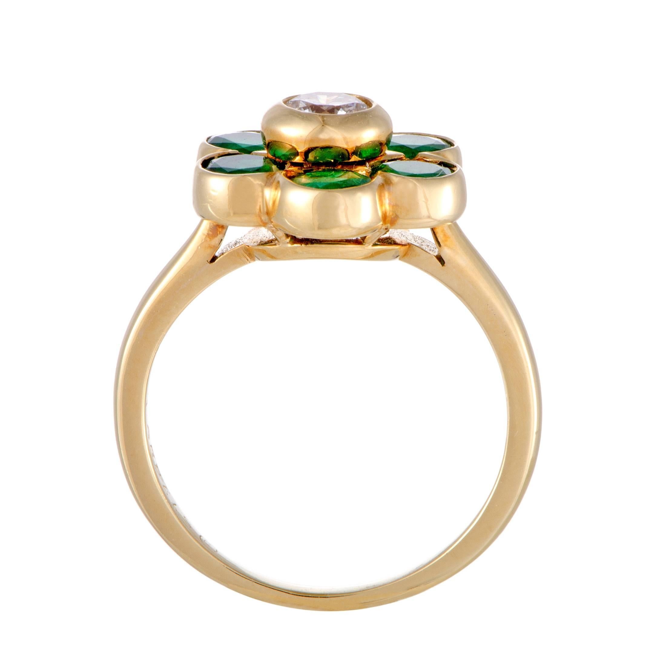 Brilliantly complemented by the vivacious emeralds weighing in total 1.00 carat, the nifty central diamond weighing 0.25ct tops off a charming depiction of a flower in this gorgeous 18K yellow gold ring from Van Cleef & Arpels.
Included Items: