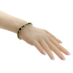 Bracelet La Triomphe en or jaune avec diamants et tourmaline verte