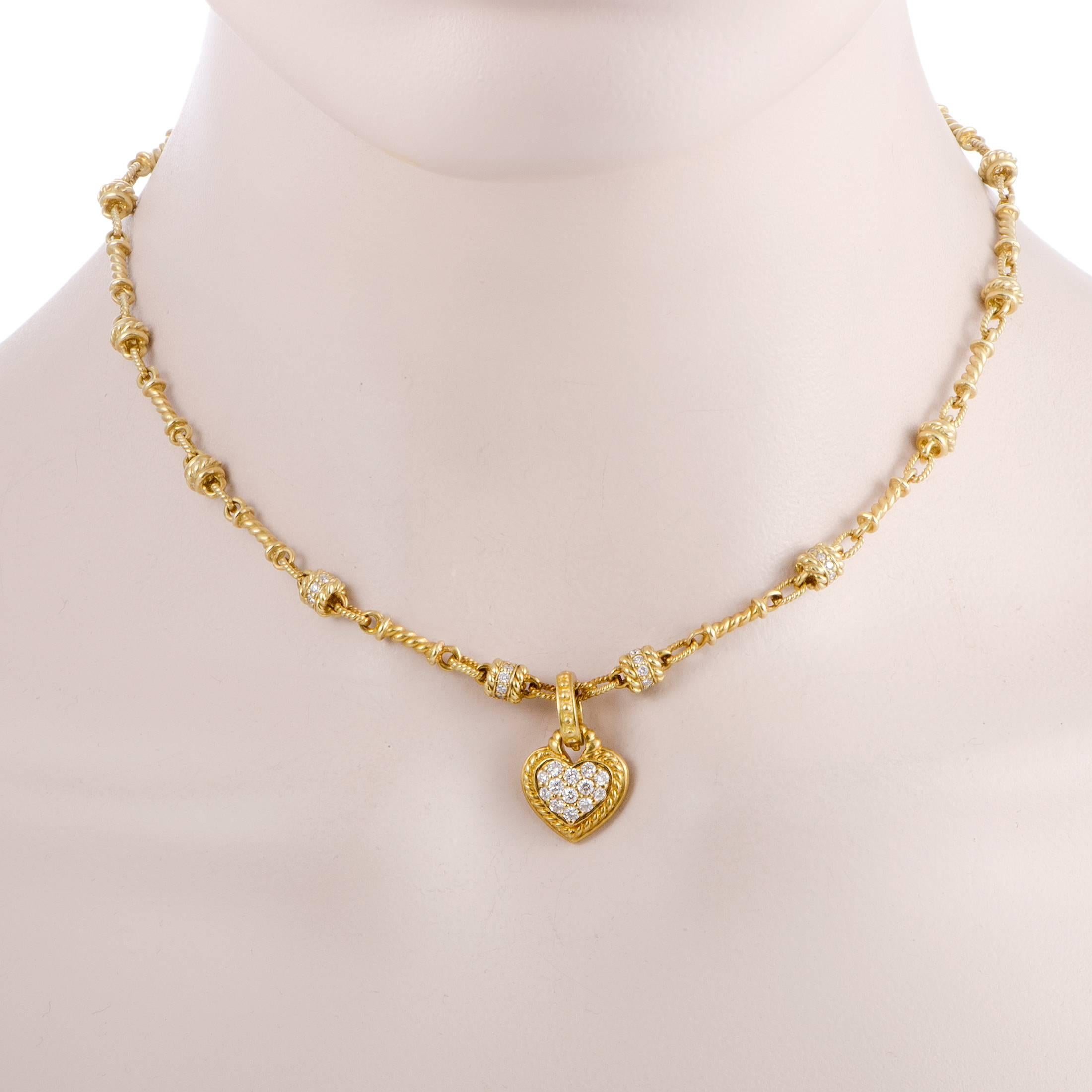 Wonderfully designed and exquisitely crafted, this delightful necklace offers charming, feminine allure thanks to the intricate details and the lovely heart pendant. The necklace – a Judith Ripka design – is made of 18K yellow gold and set with